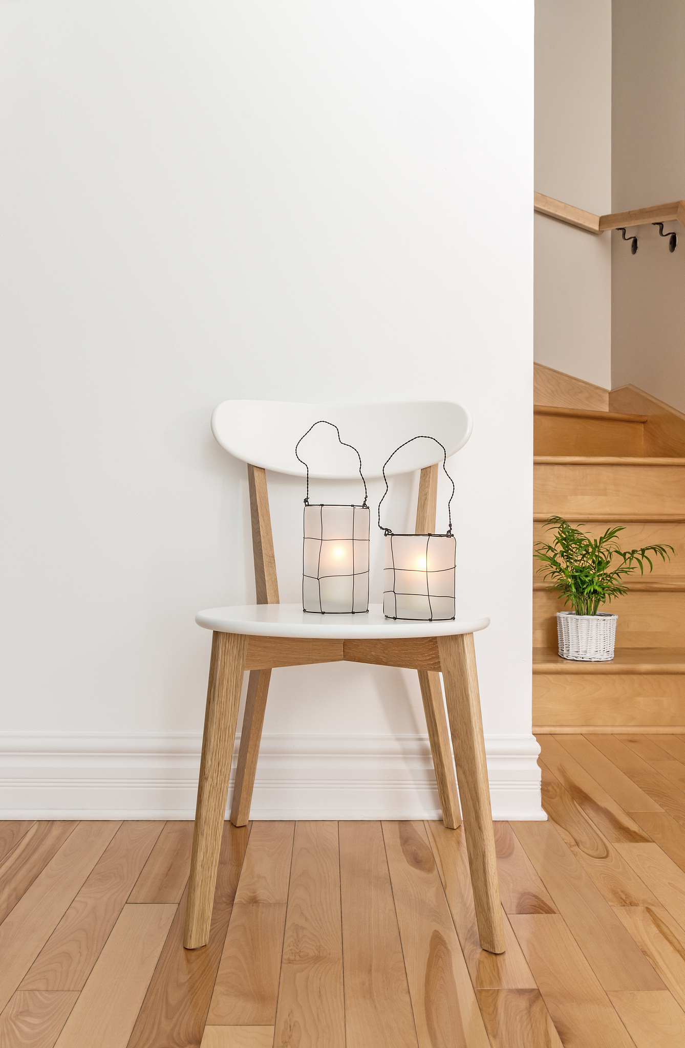 lanterns on a white chair