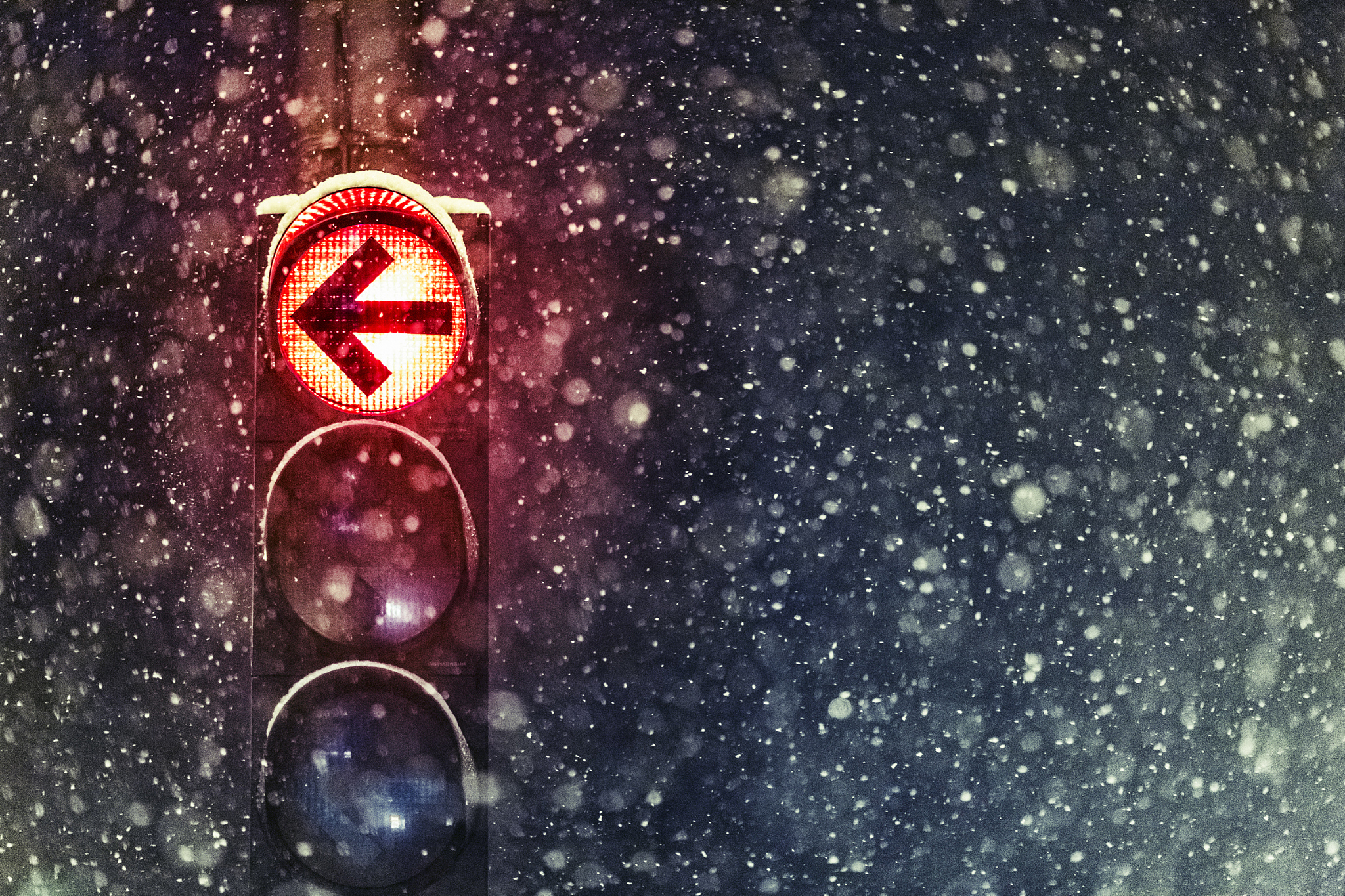 semaphore on a windy, snowy night