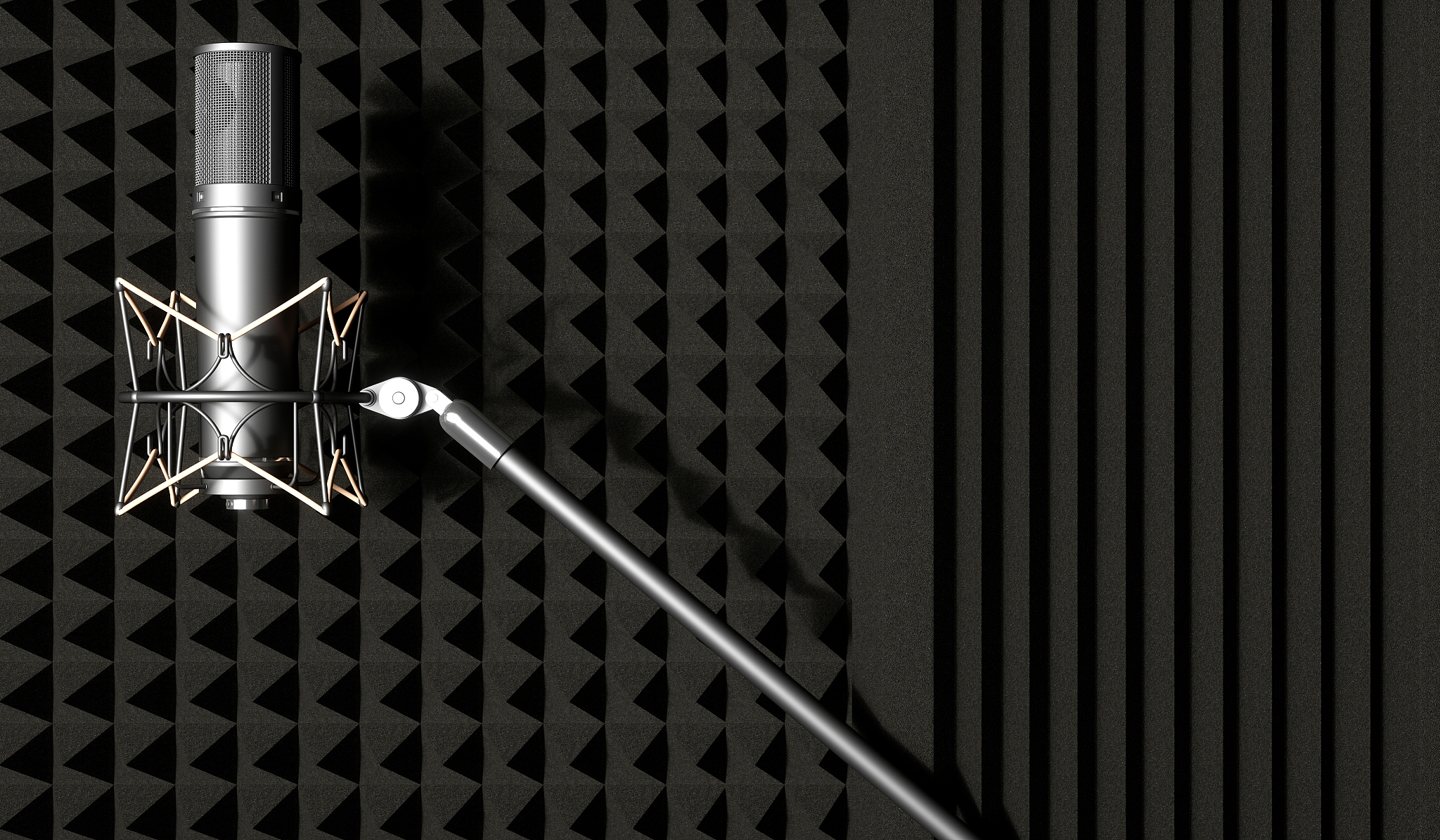 silver microphone on a black background