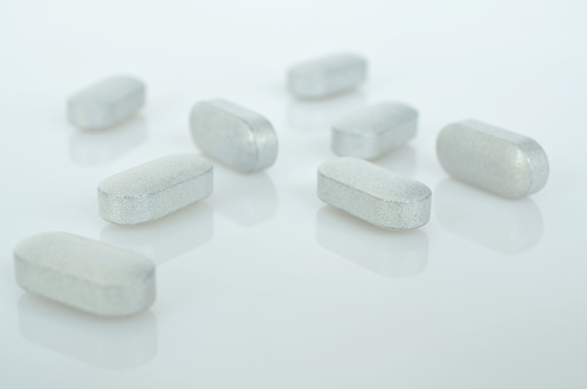 white medicine tablets antibiotic pills.