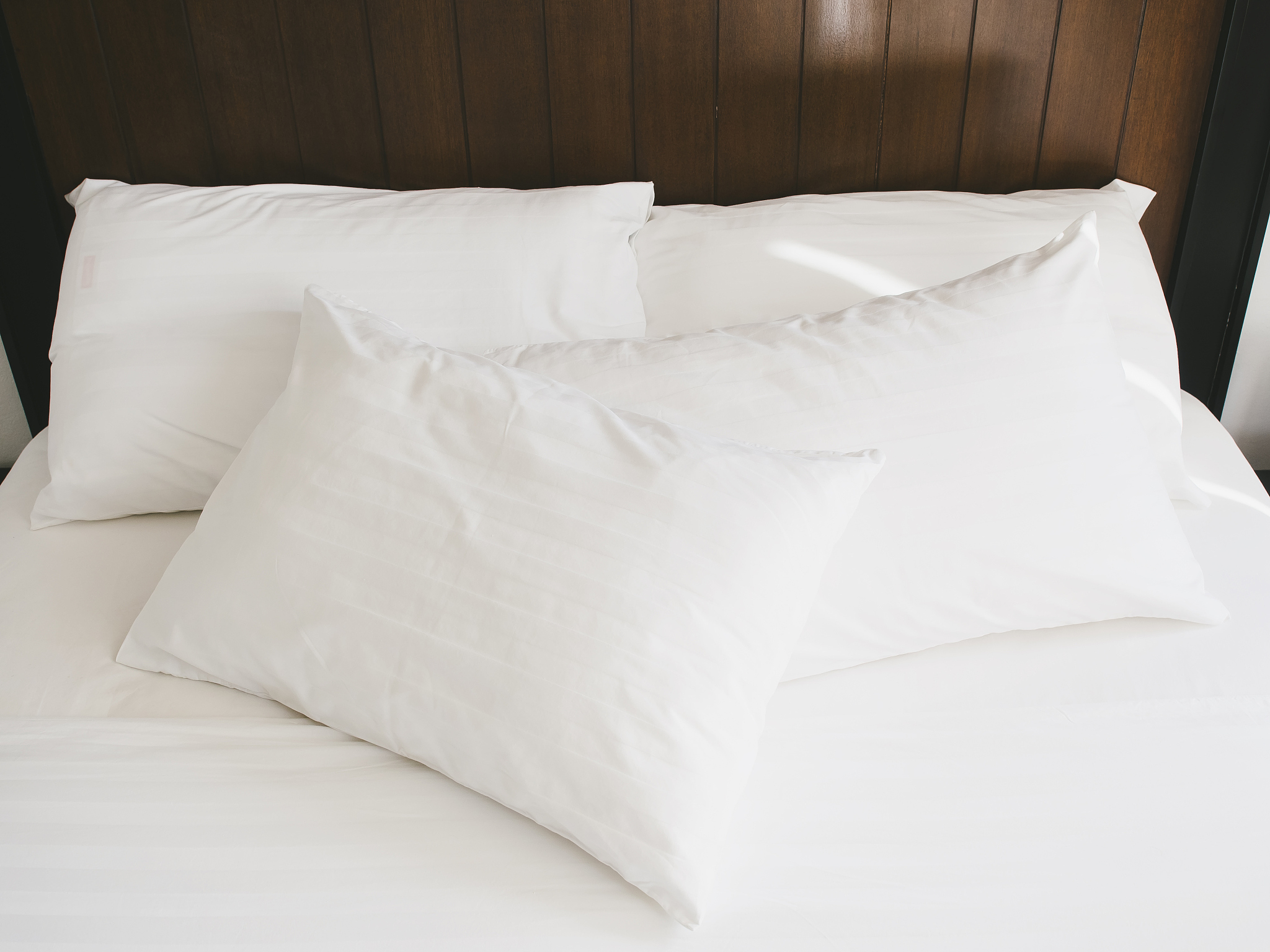 bed and pillows in bedroom