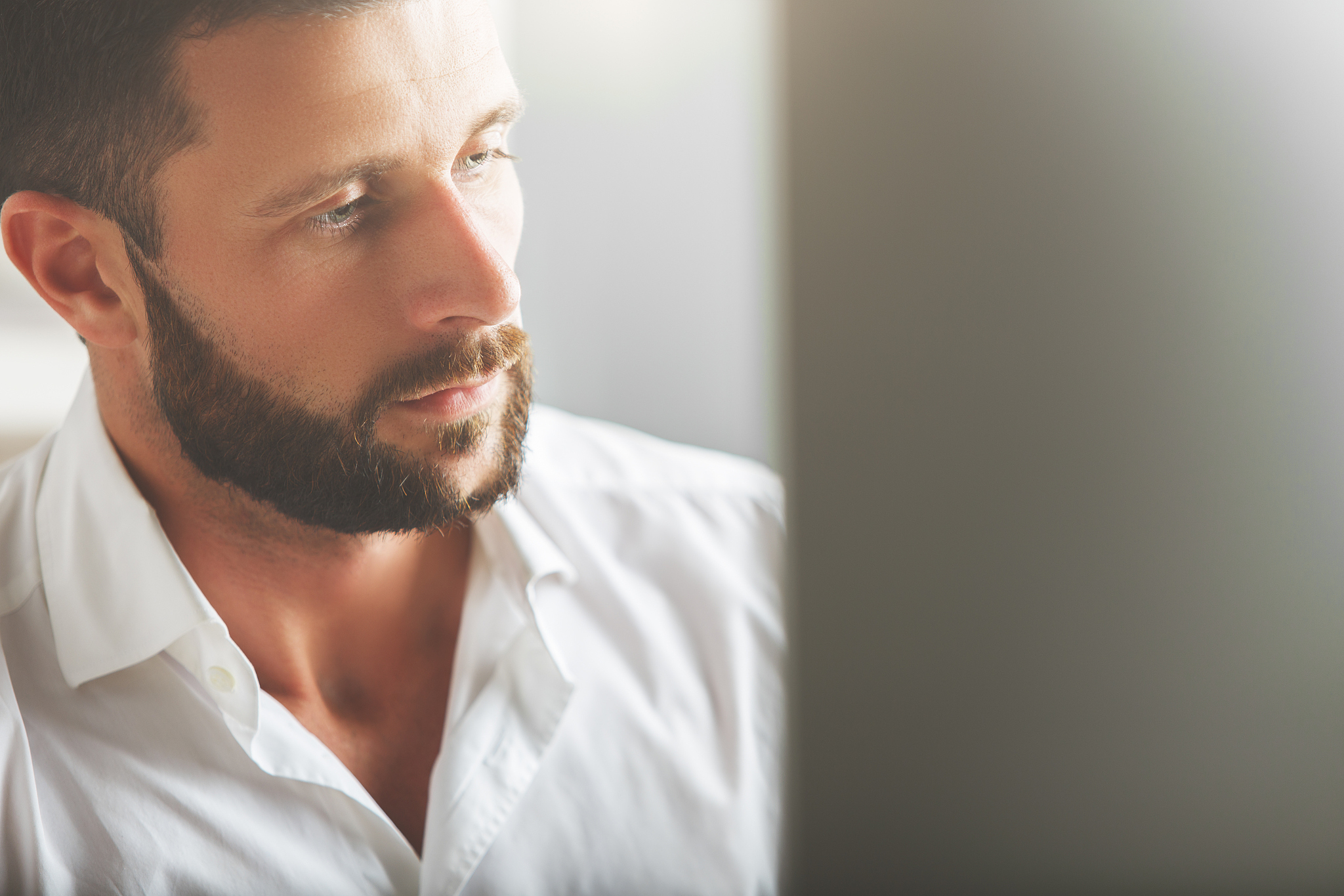 thoughtful man with monitor