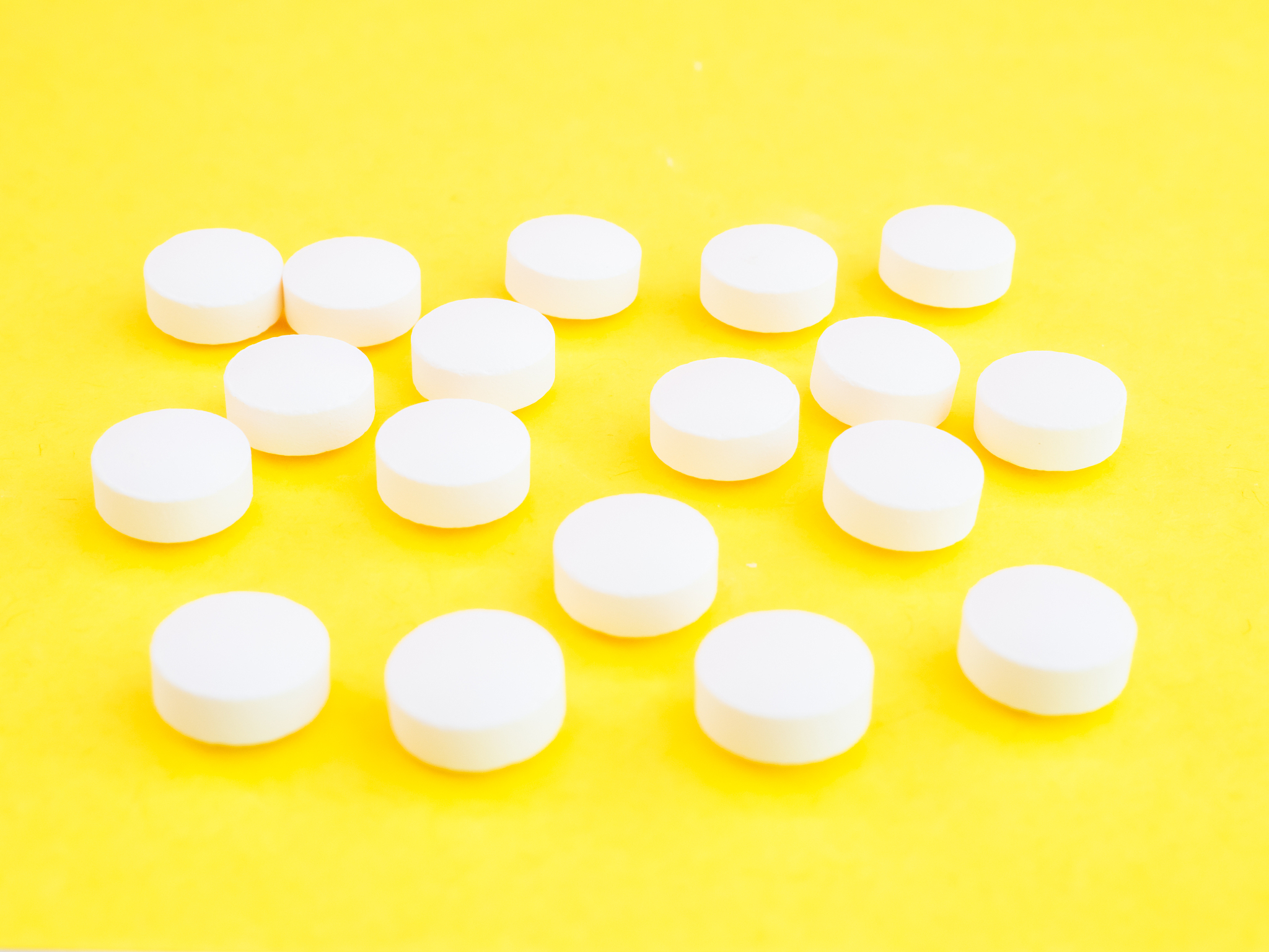 a lot of round white pills