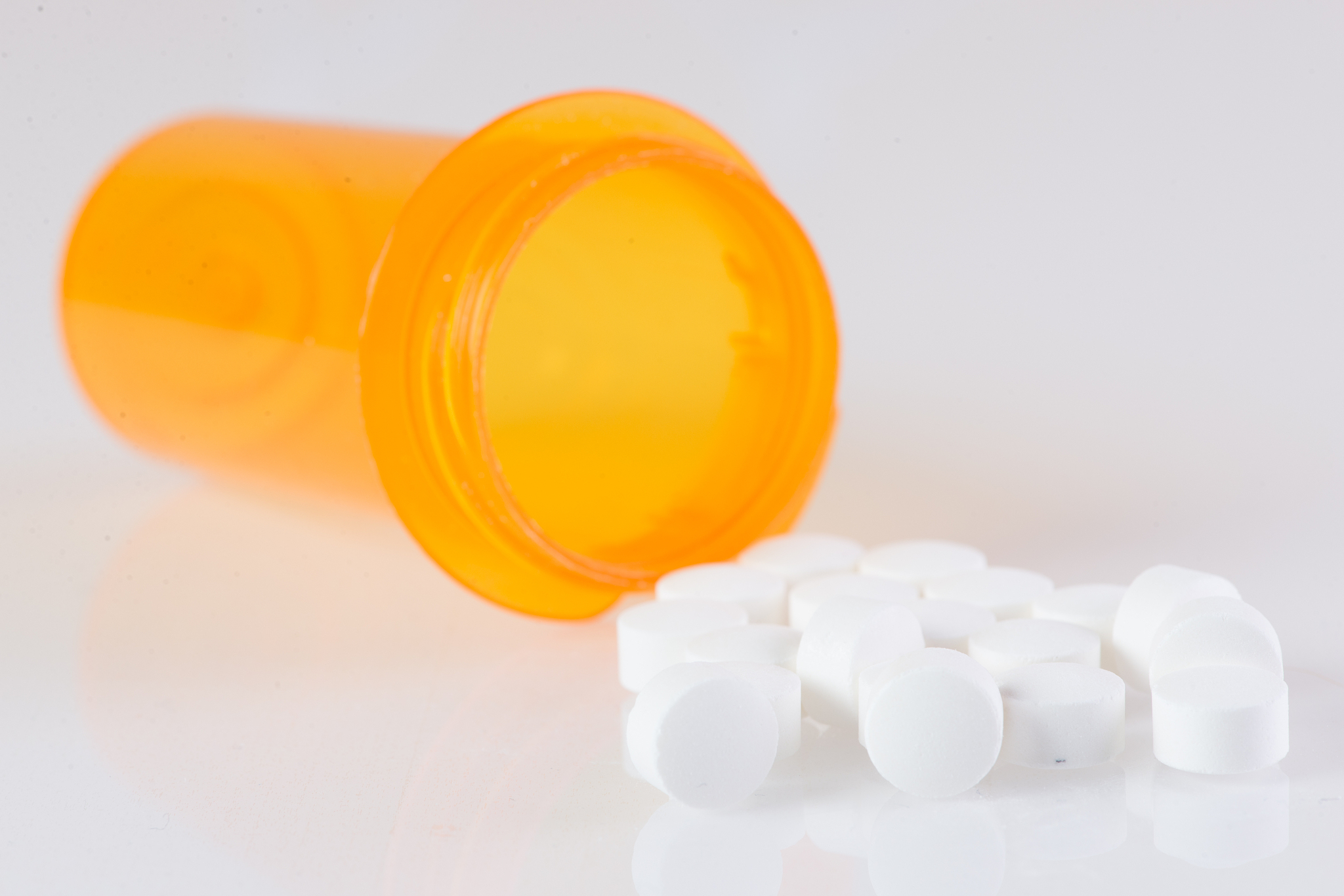 prescription bottle and pain pills