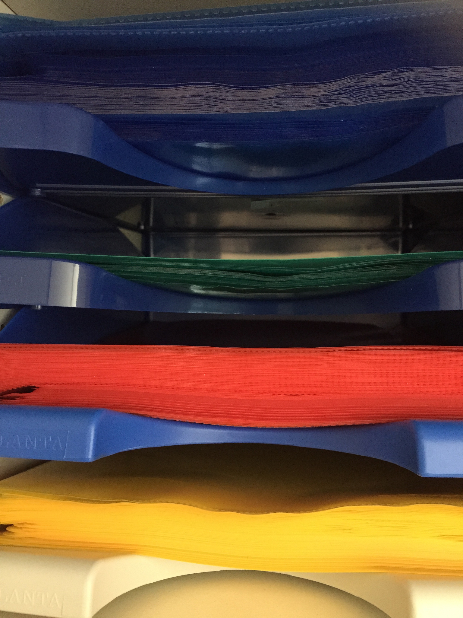 close-up of multi colored folders in office