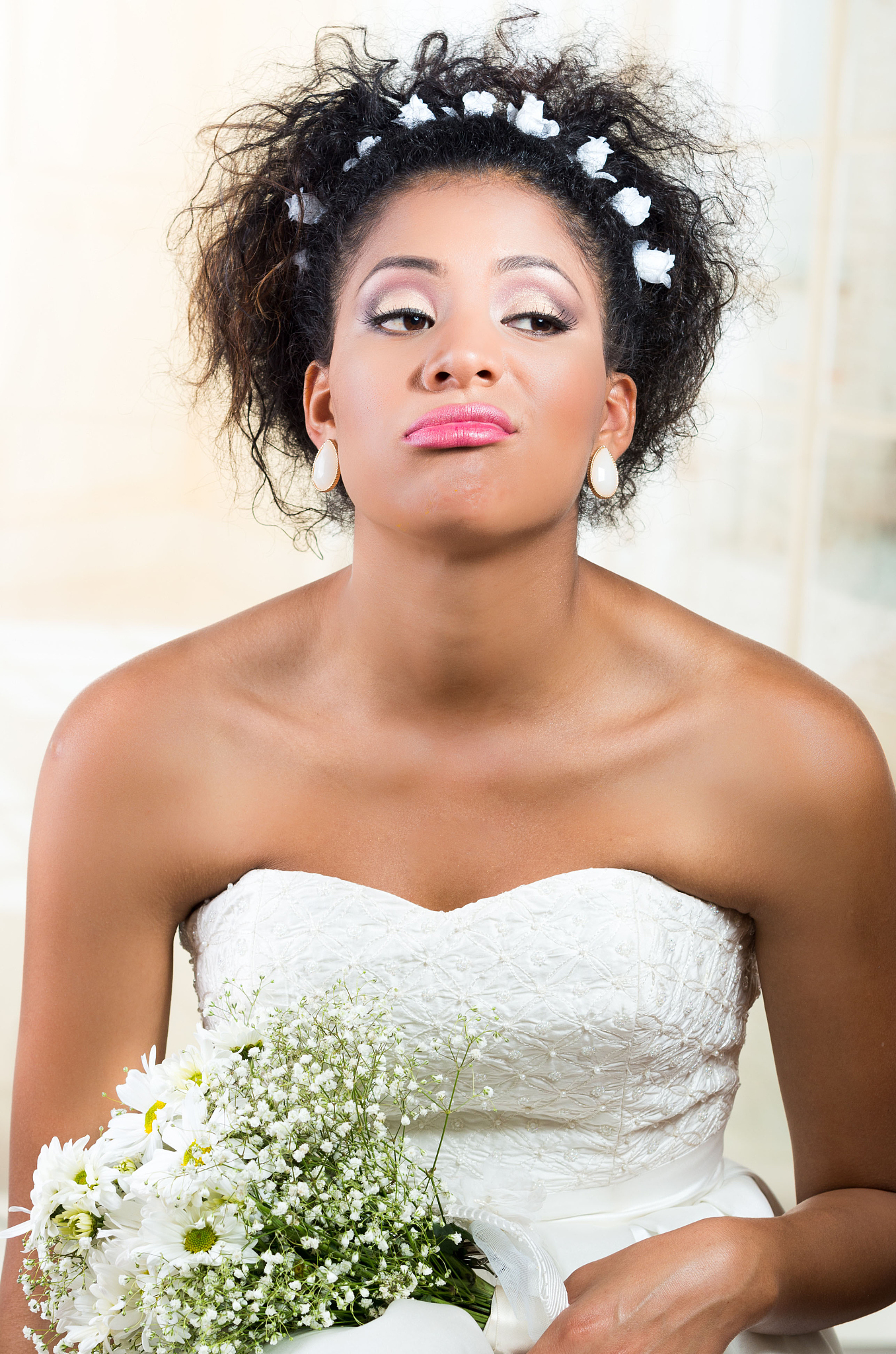 portrait of beautiful exotic emotional bride looking bored