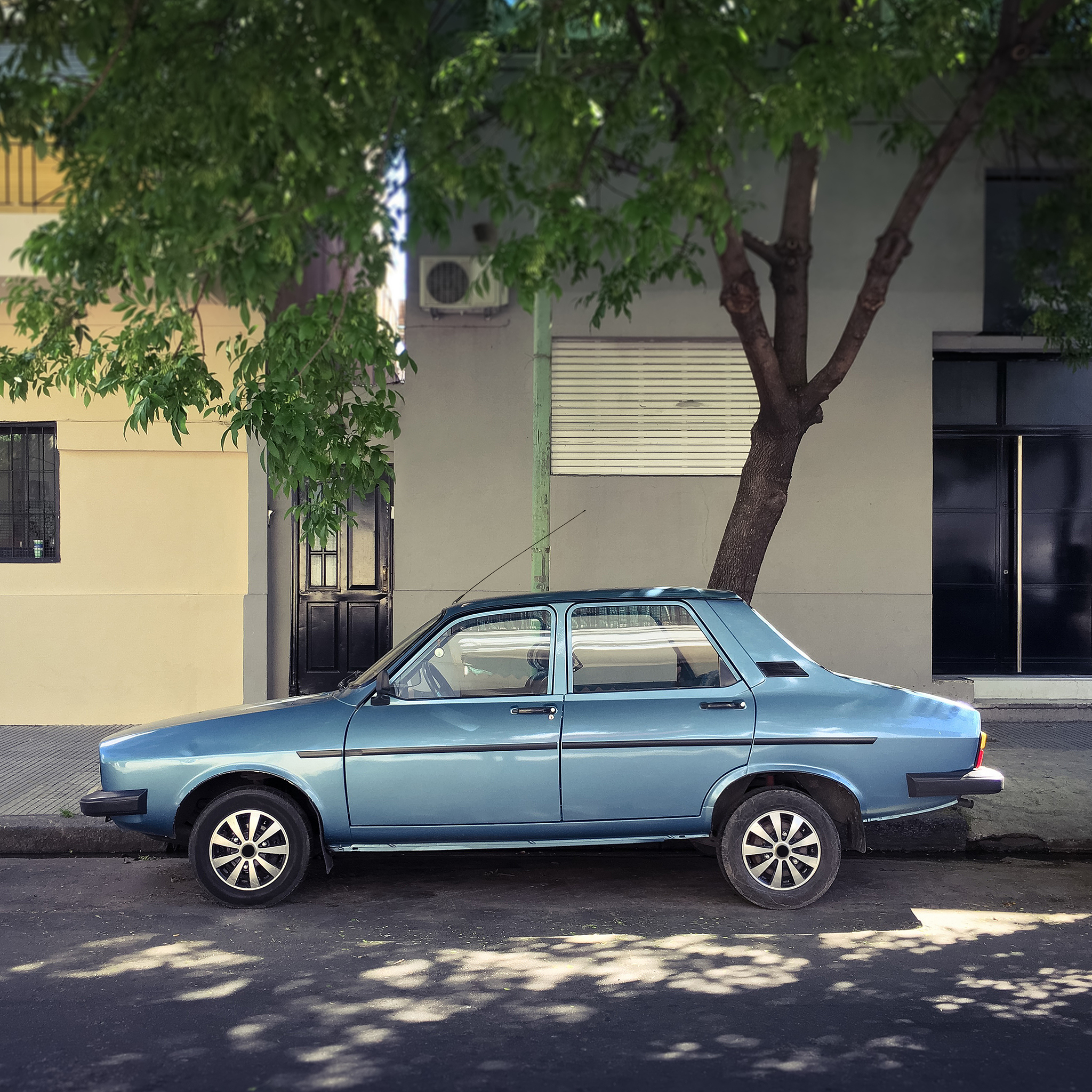 old car parked in the street