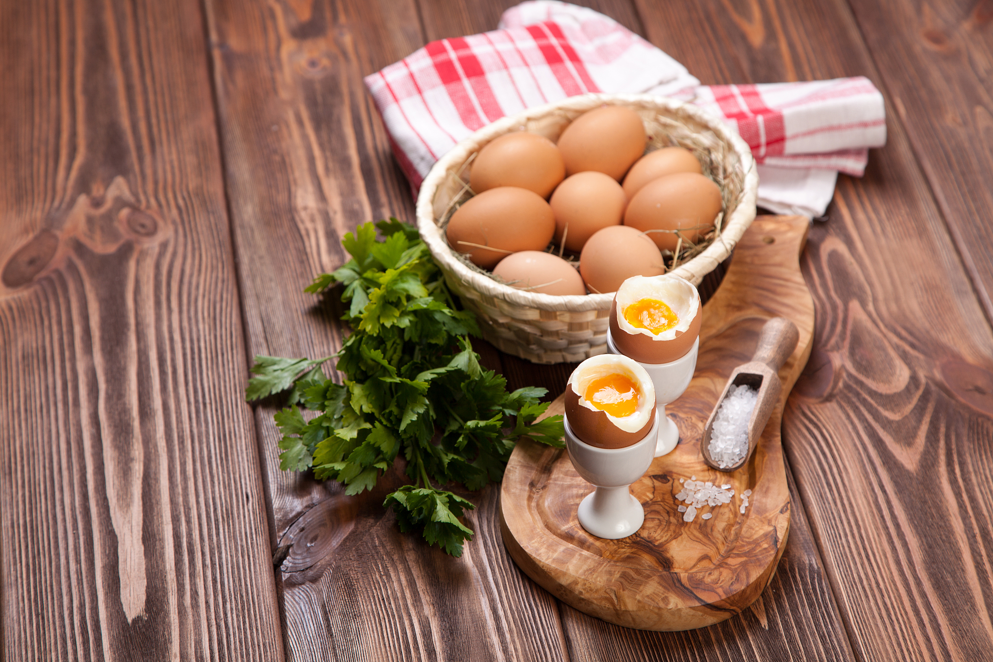 boiled eggs on a wooden background