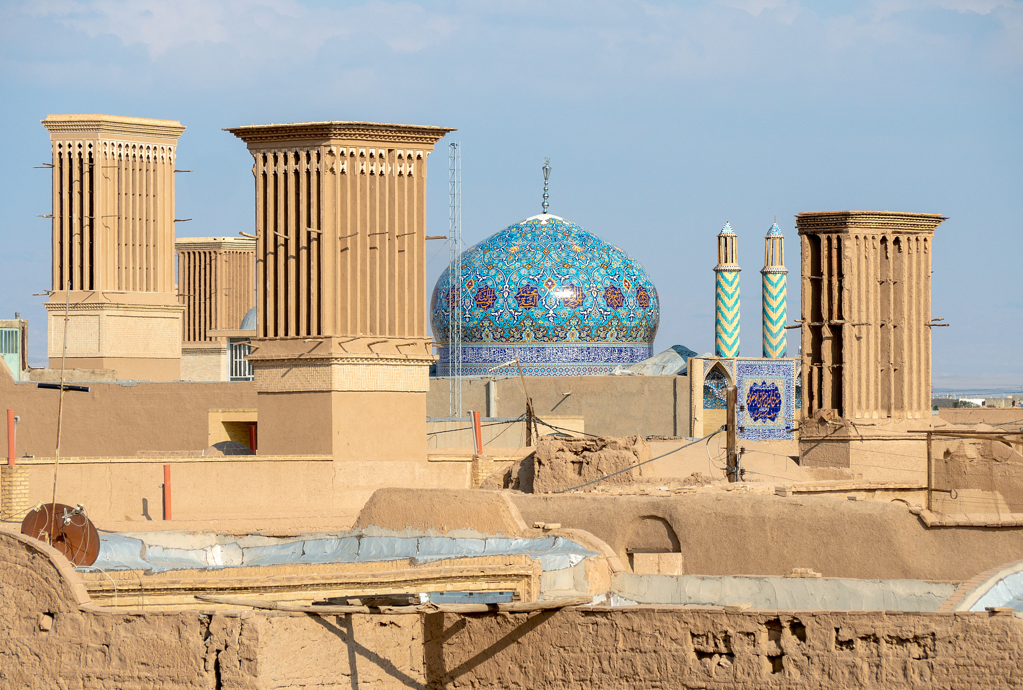 yazd cityscape with ancient wind towers, iran