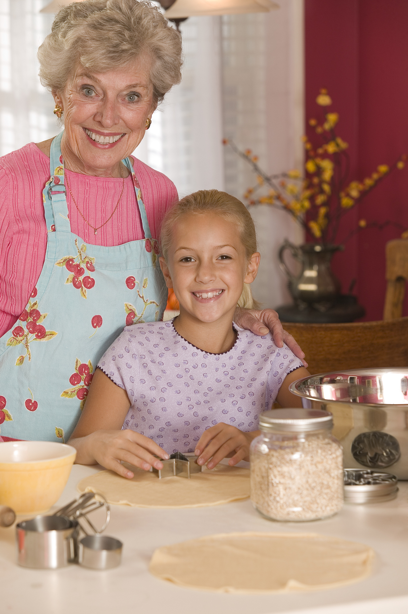grandmother and granddaughter baking