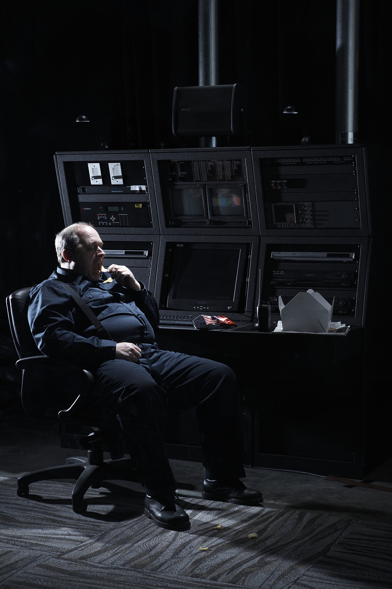 security guard sitting in office