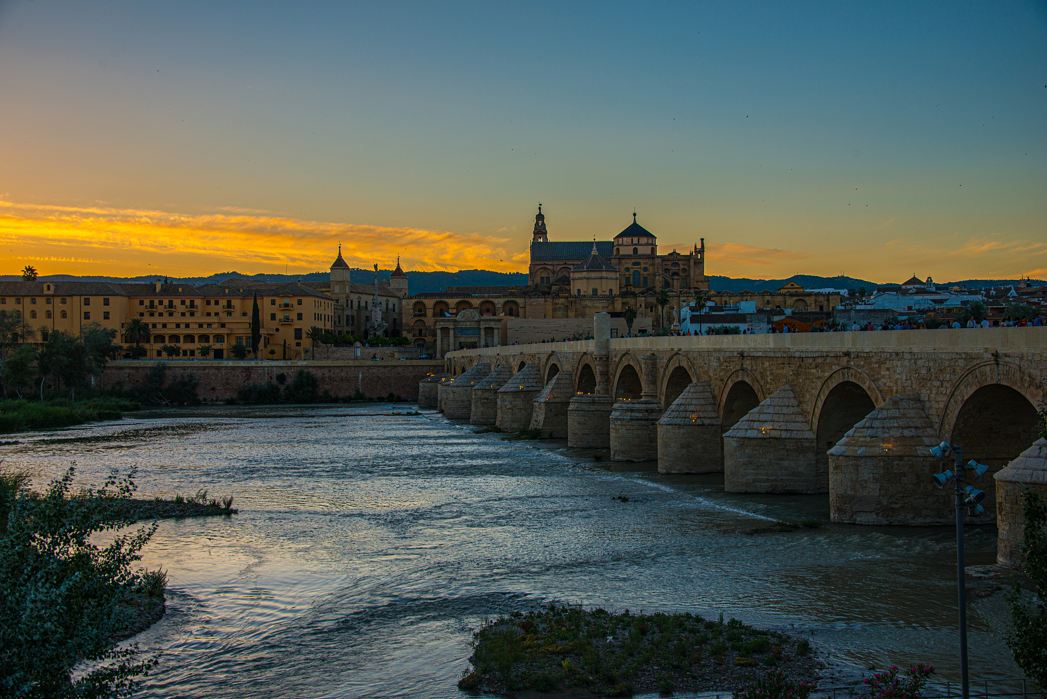 mosque-cathedral and roman bridge of cordoba, andalusia, spain