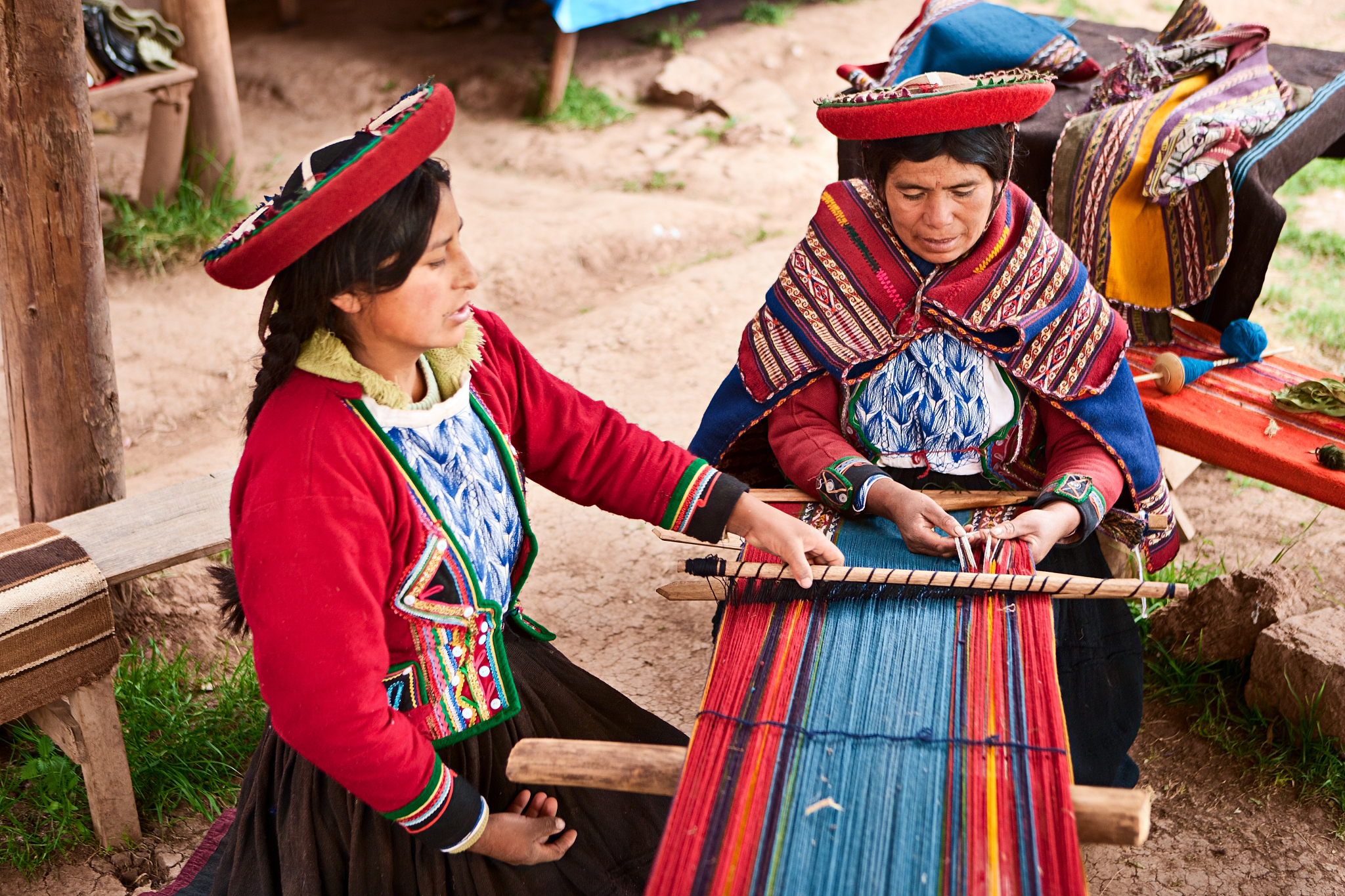peruvian woman weaving, the sacred valley, chinchero