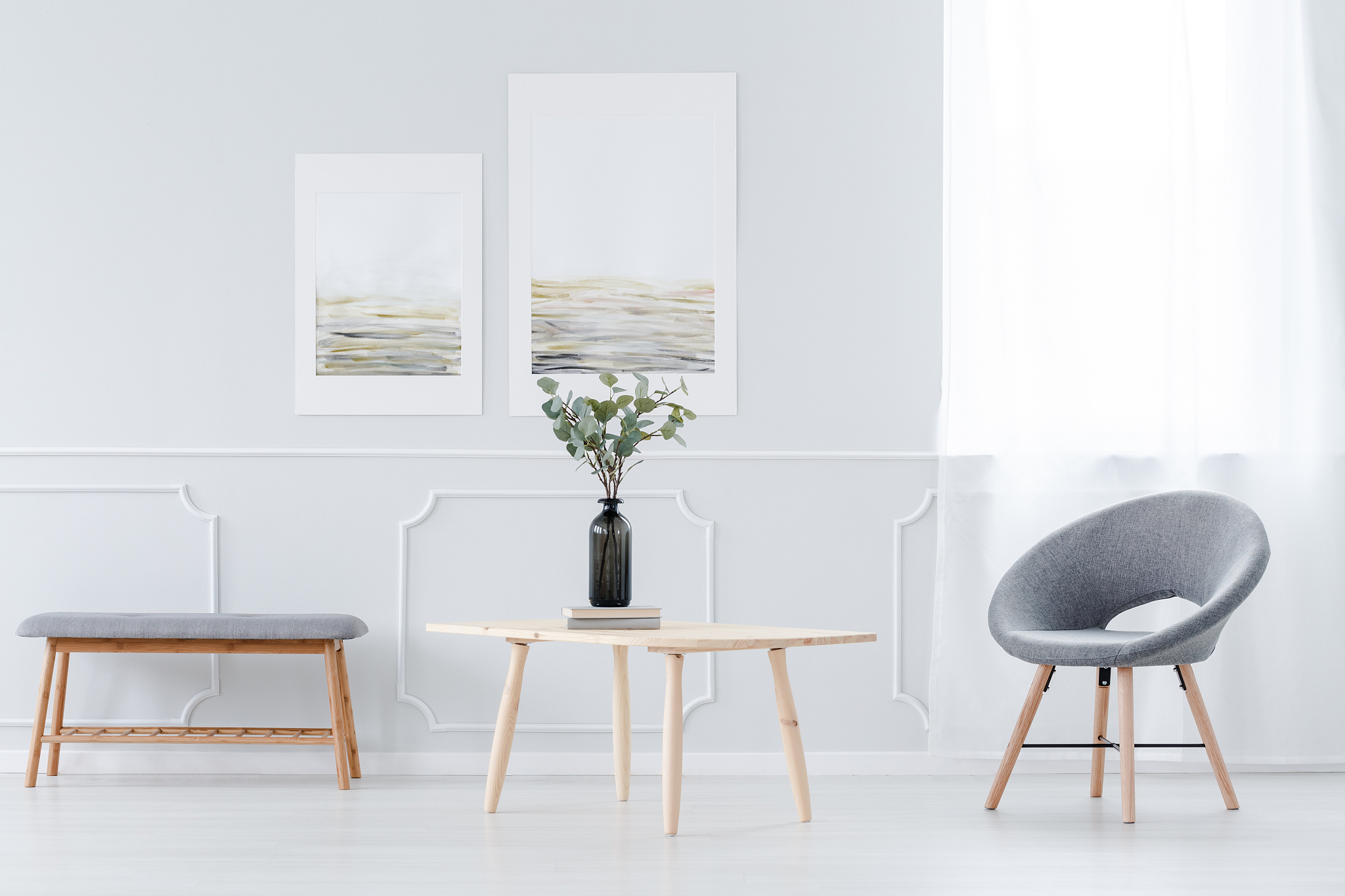 posters in bright living room