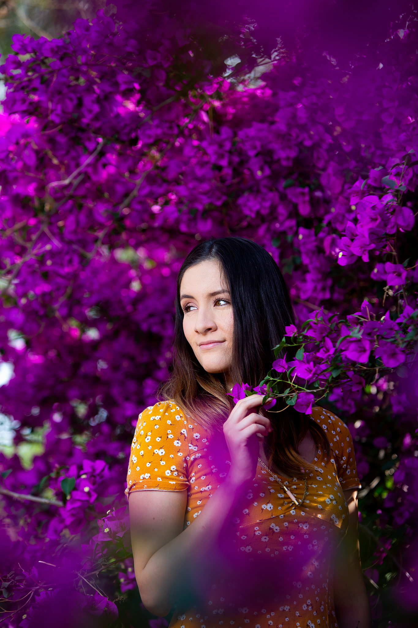 young woman with flowers background