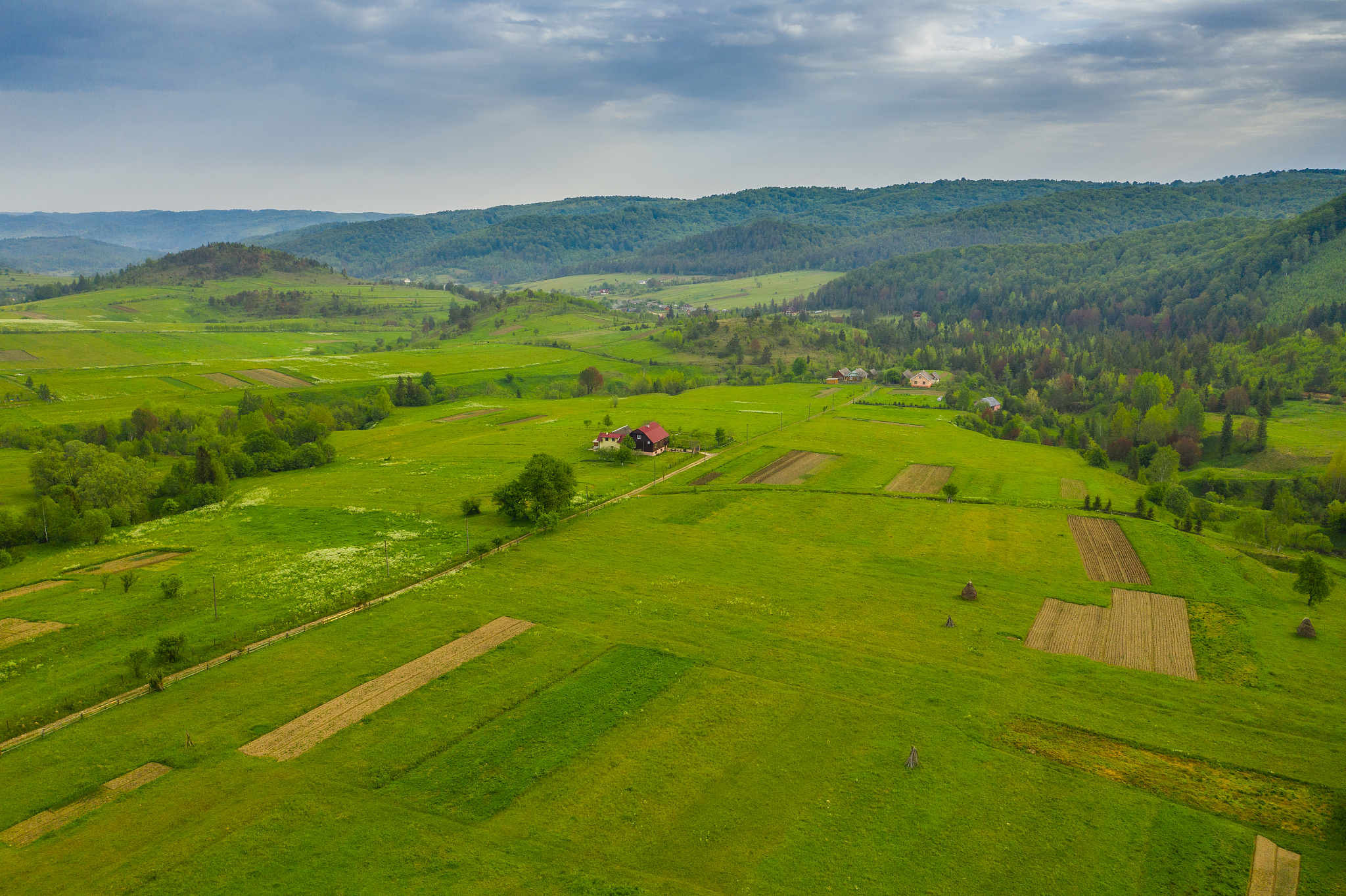 valley in the mountains before the summer rain