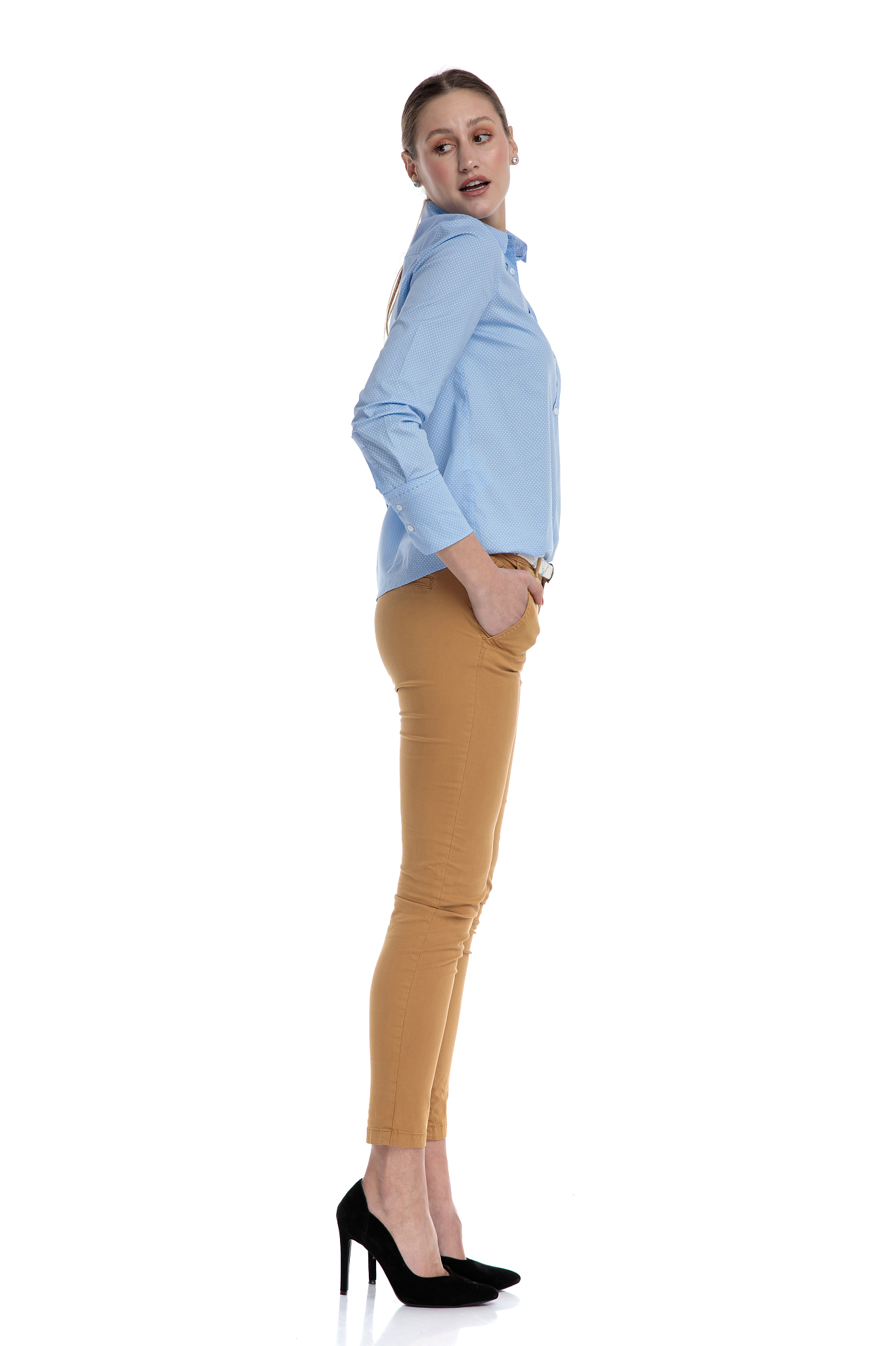 young businesswoman wearing blue shirt and looking to side