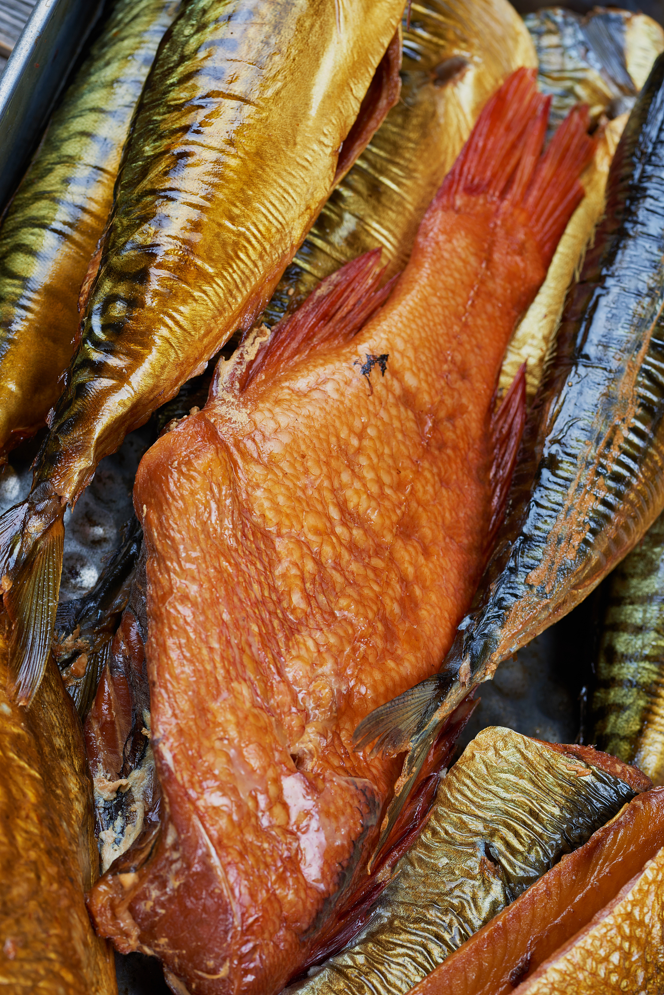 set of smoked fish in a tin pan