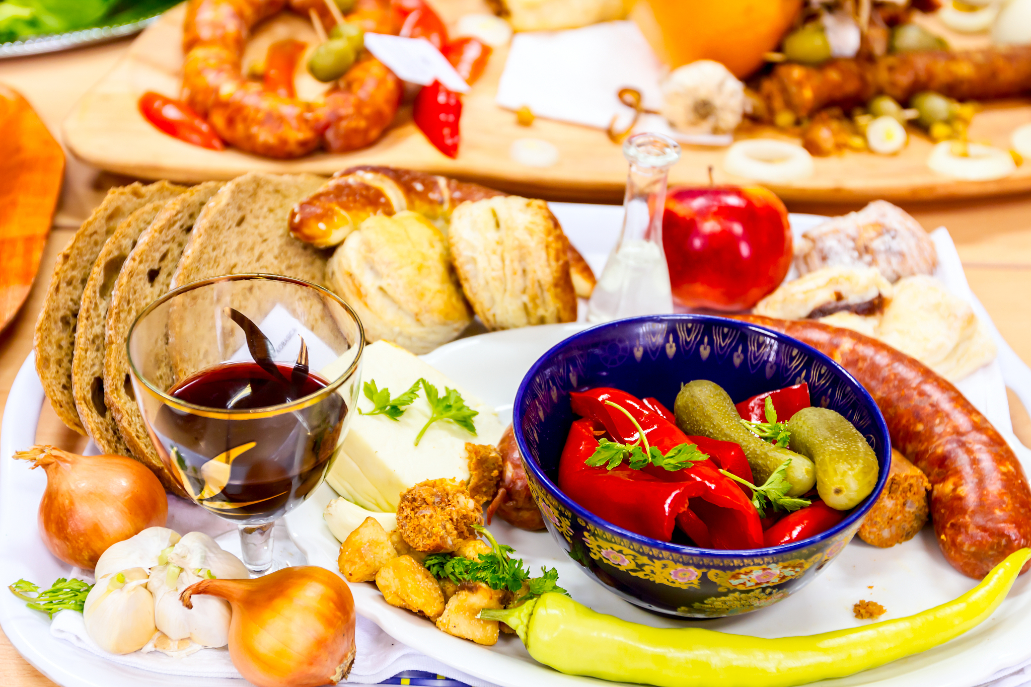 traditional sausages are decorated with fresh green chili pepper