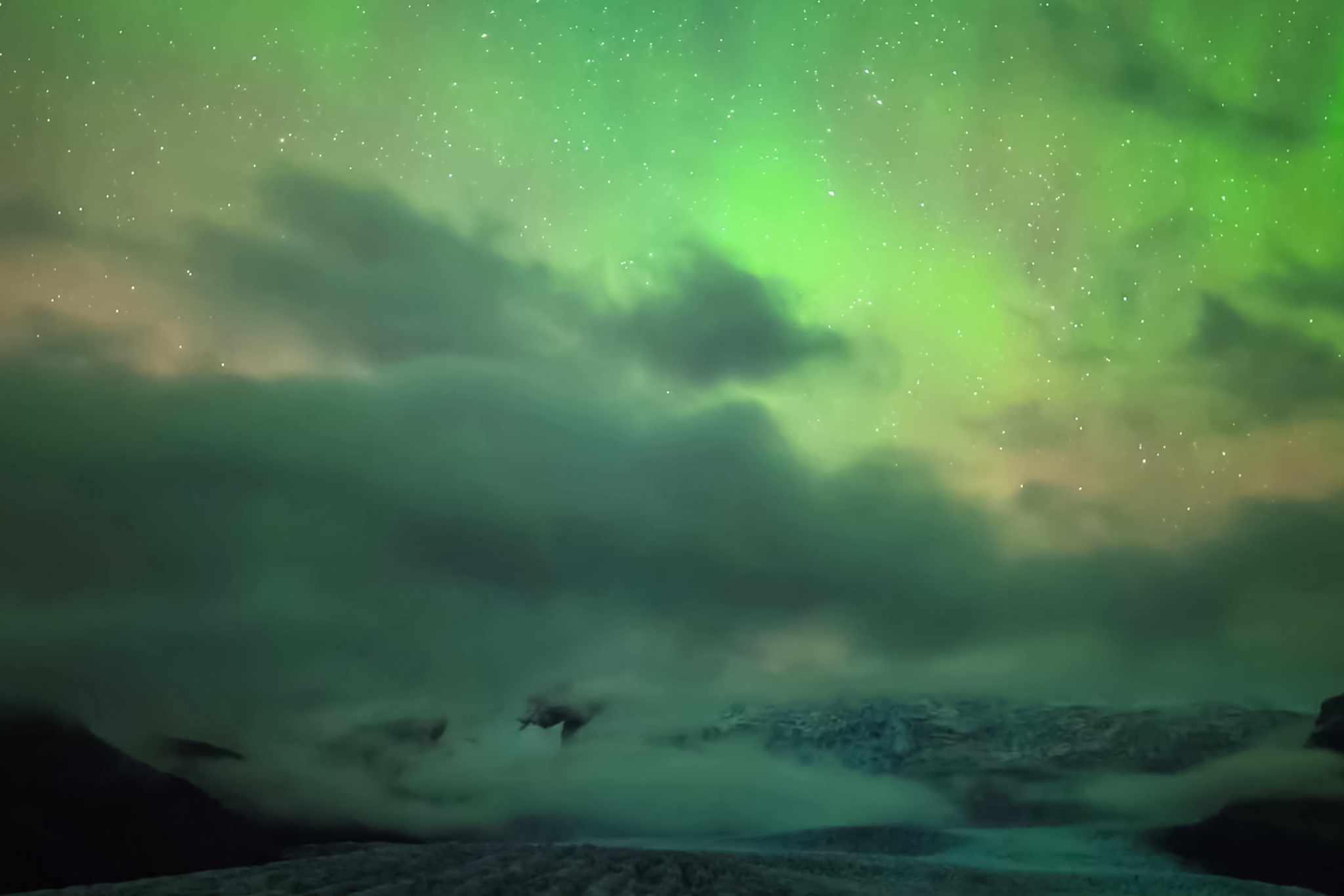 aurora borealis in night northern sky. ionization of air particl