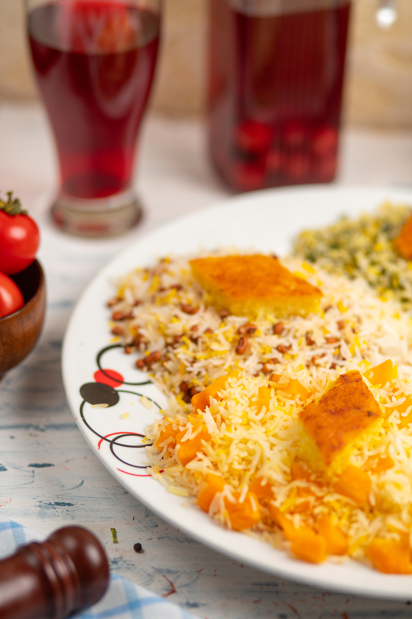 chigirtma plov, rice garnish with vegetables and herbs.