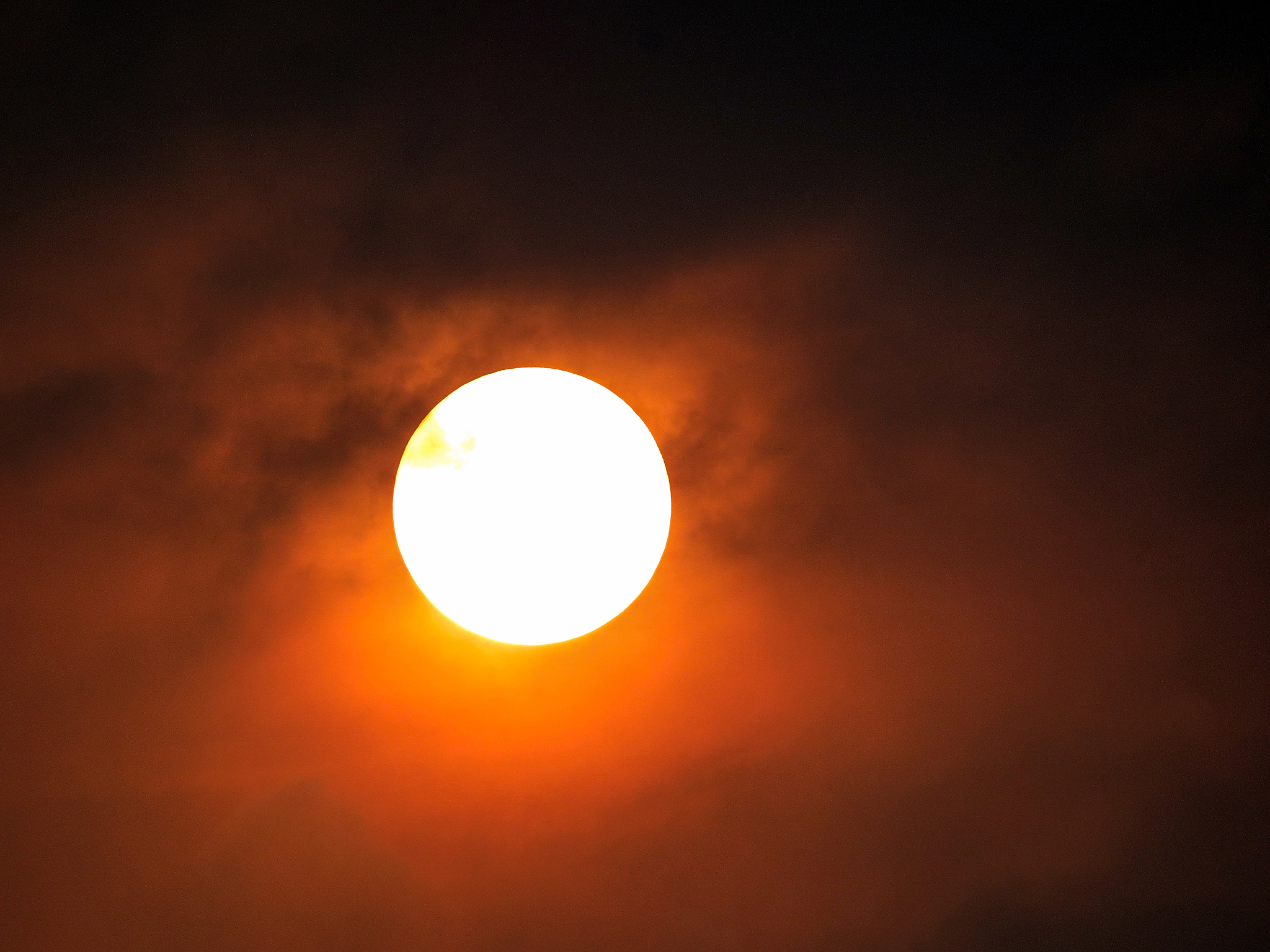 amazing sunset between clouds