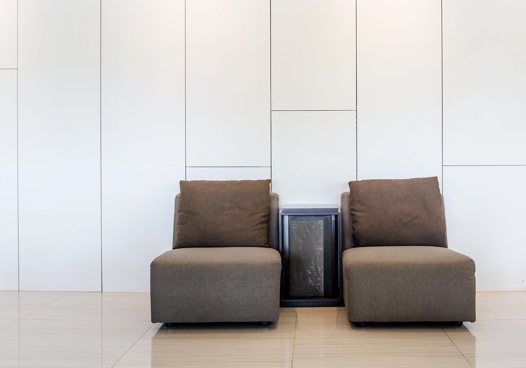 white modern interior with modern brown design sofa chair and wh
