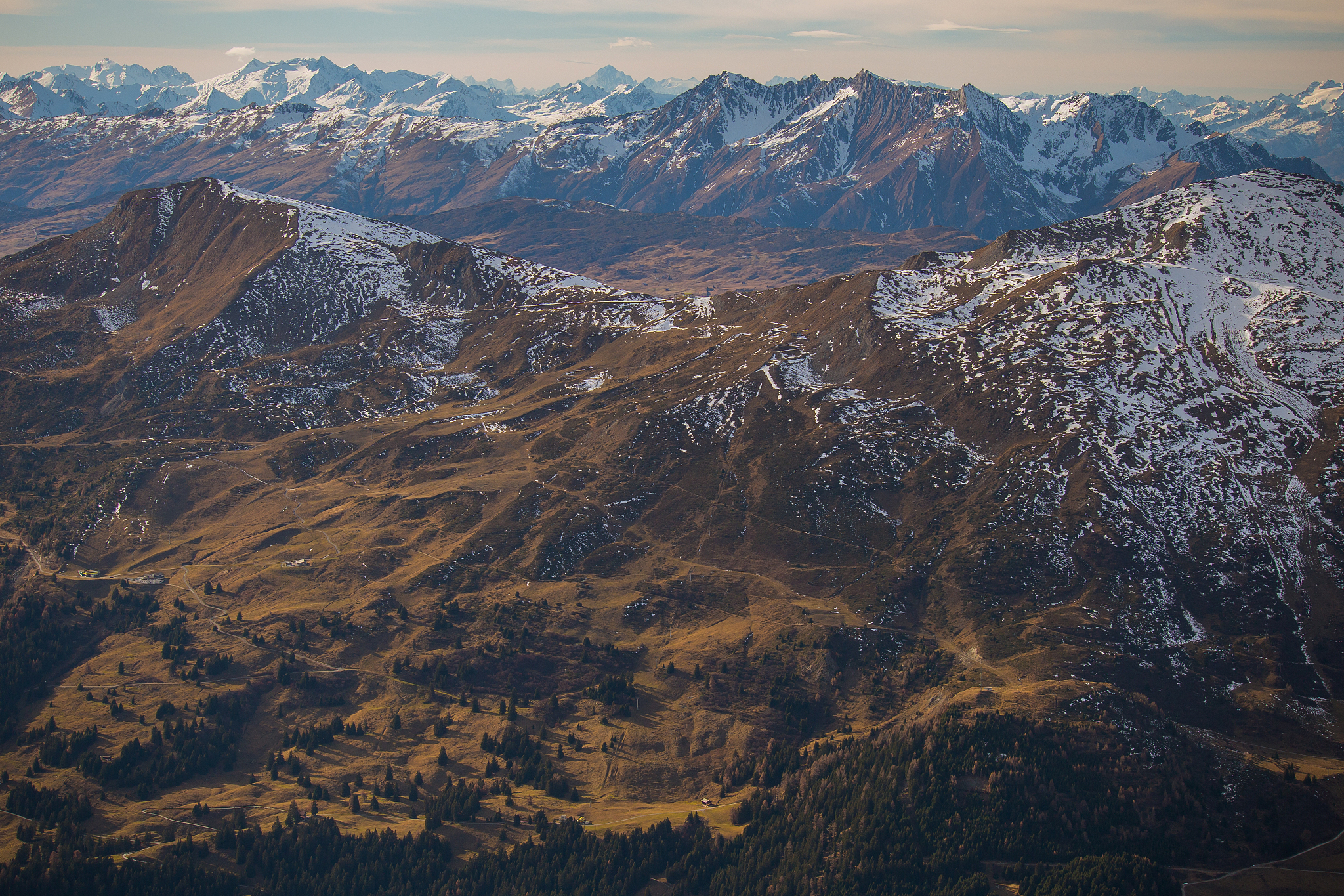 aerial view of snowcapped mountains against sky,arosa,switzerlan