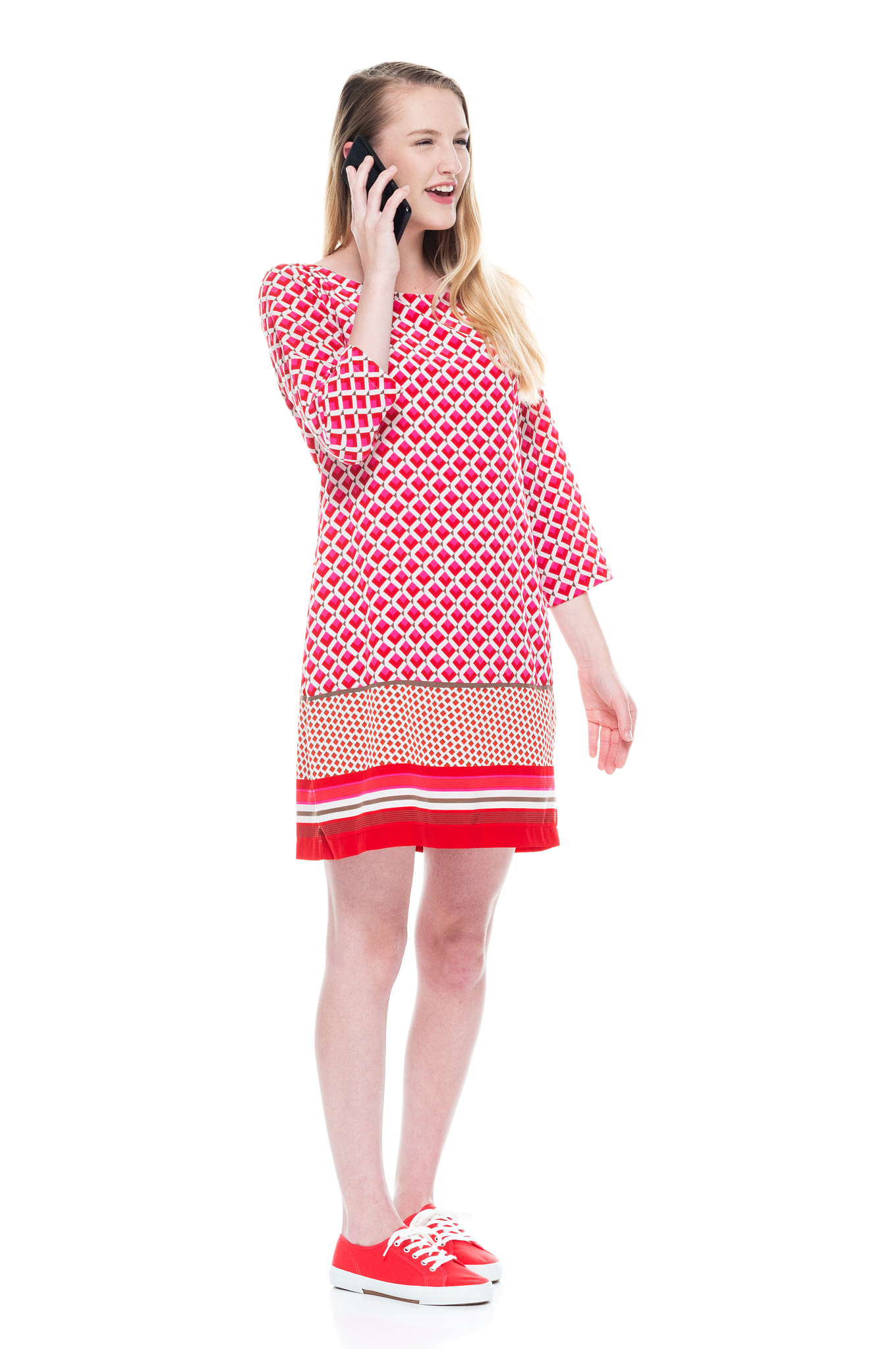 beautiful young white female wearing red dress - talking on smar