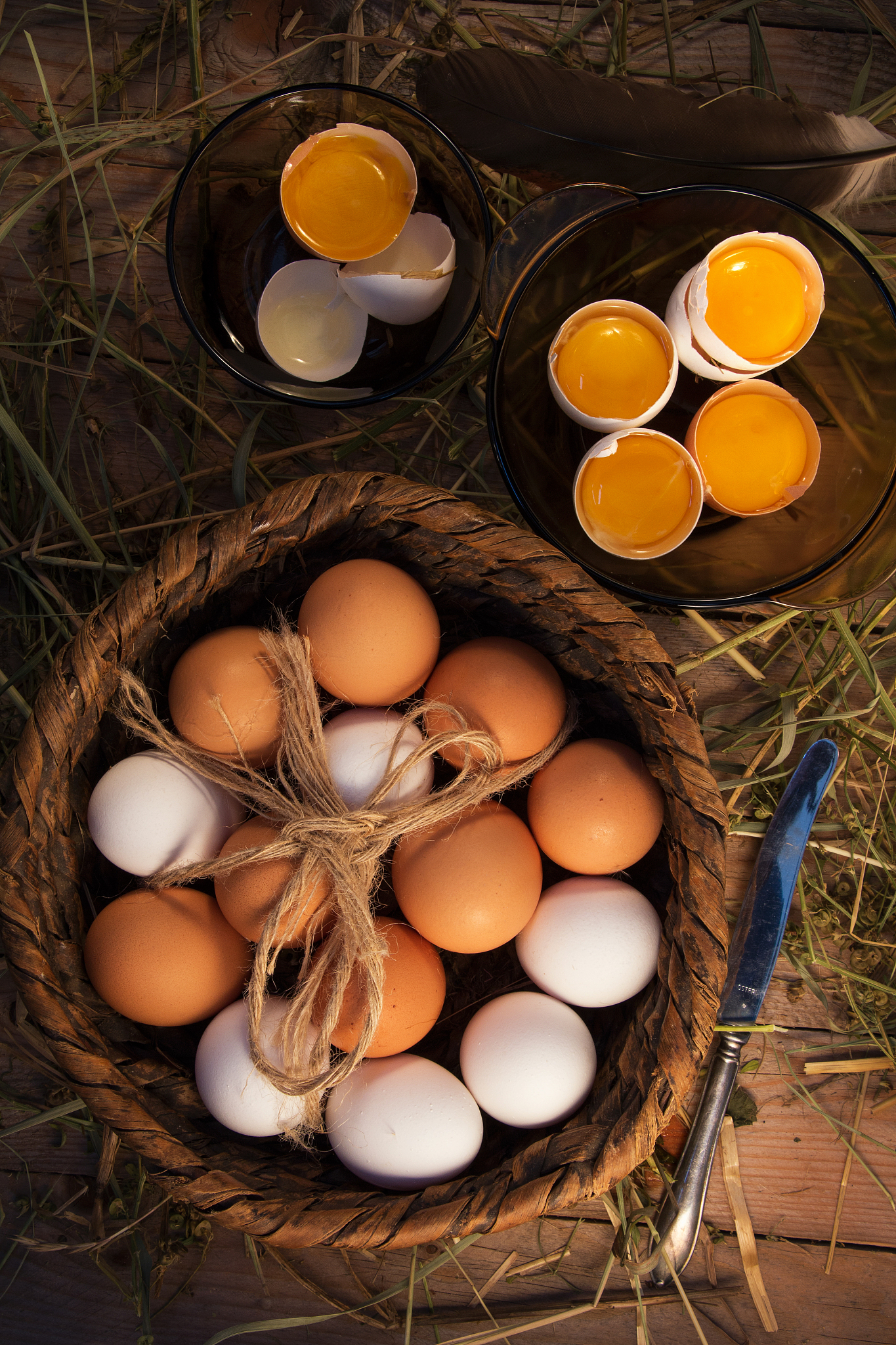 chicken eggs homemade  are in a wooden basket.