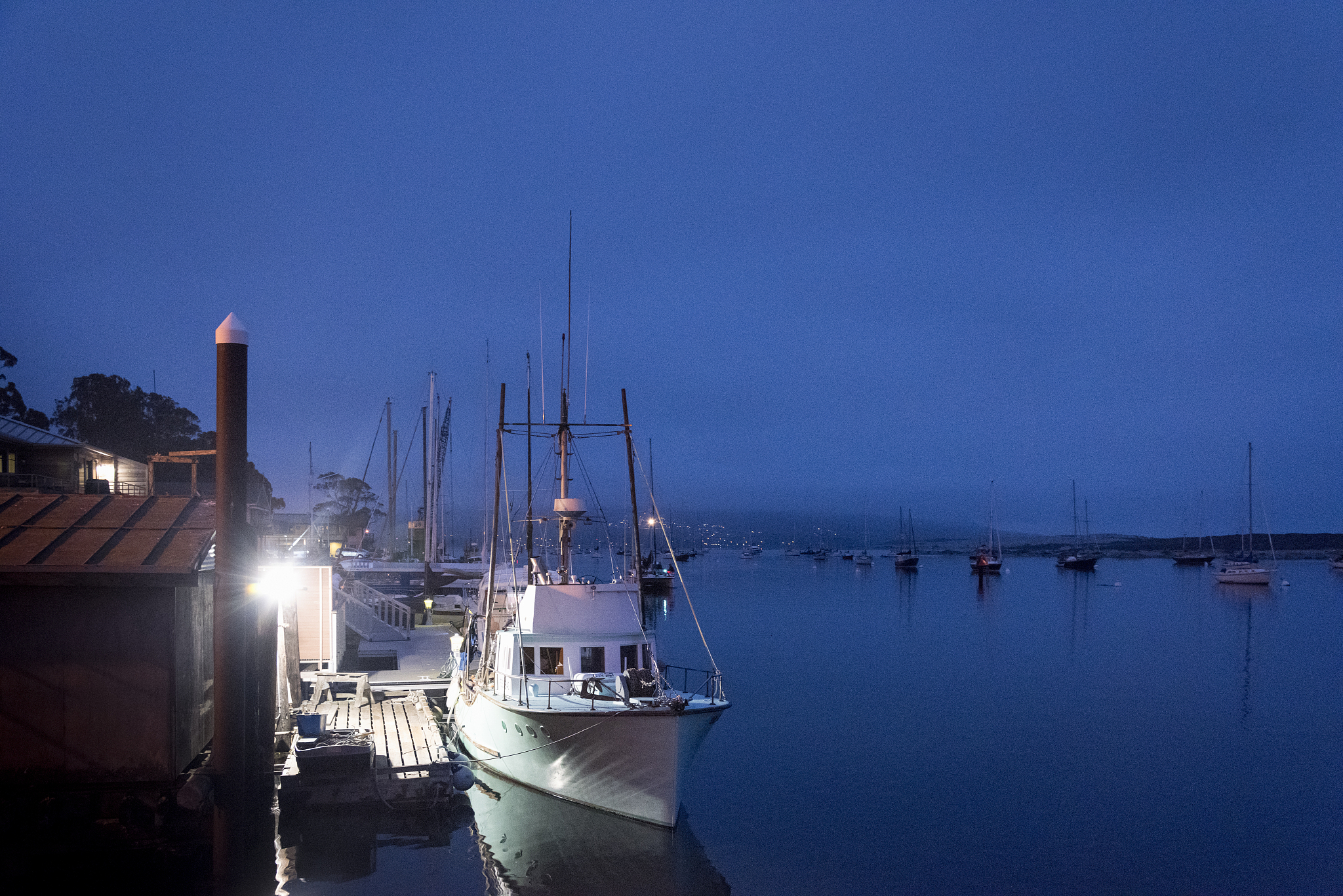 fishing boat at morro bay at dusk
