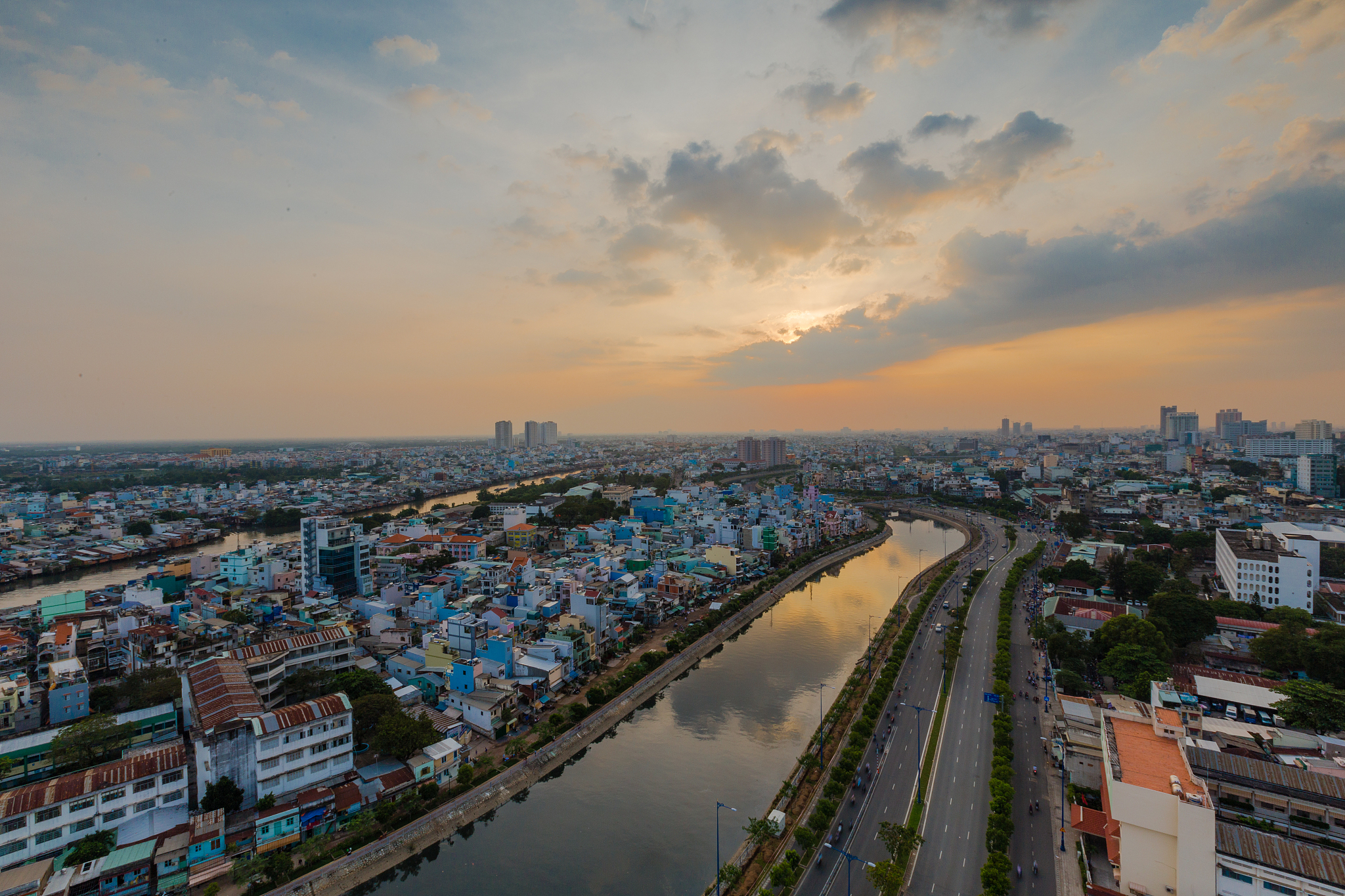 the winding curves of the nhieu loc canal in the sunset.
