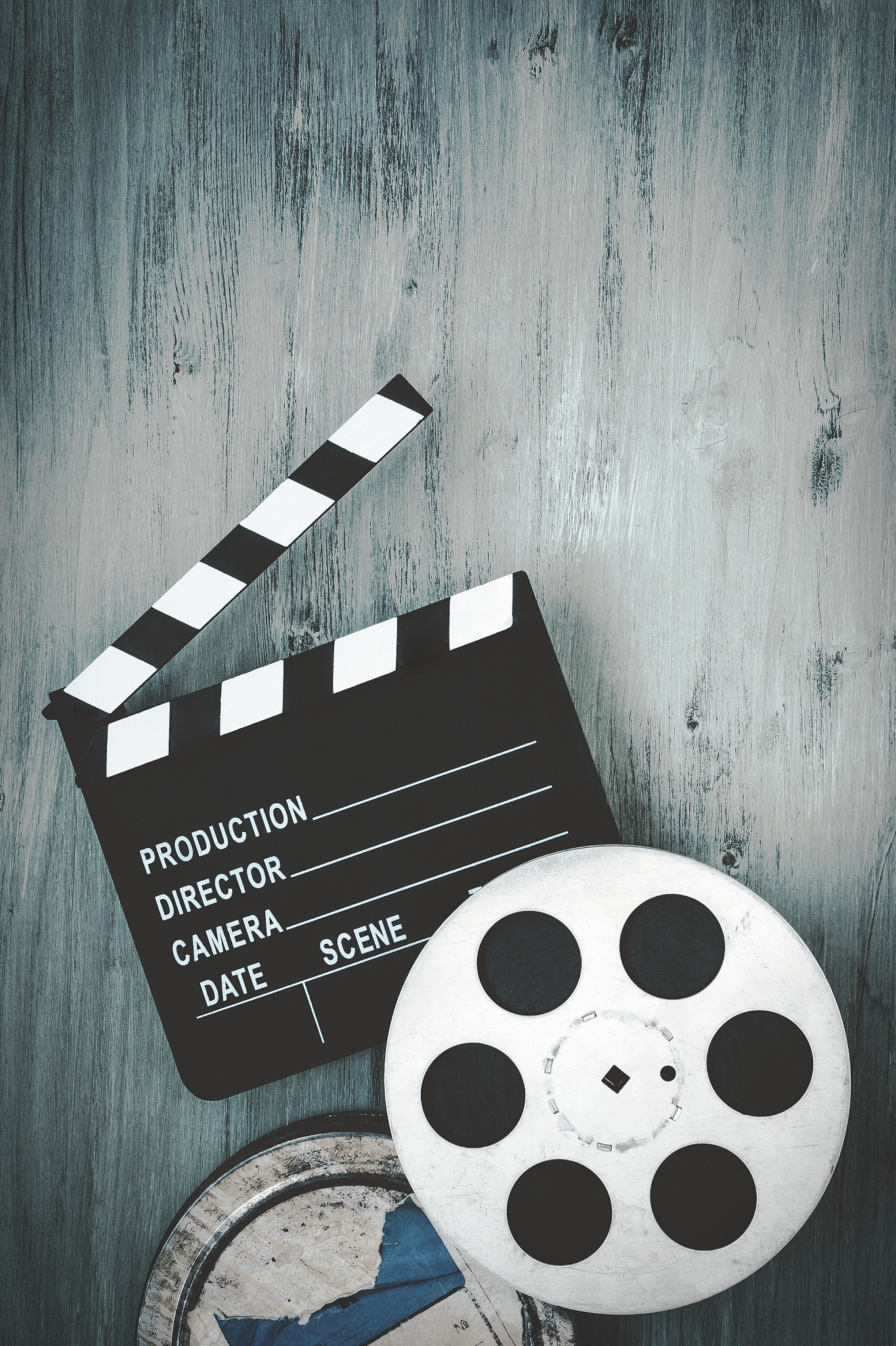 clapperboards and the reel of film