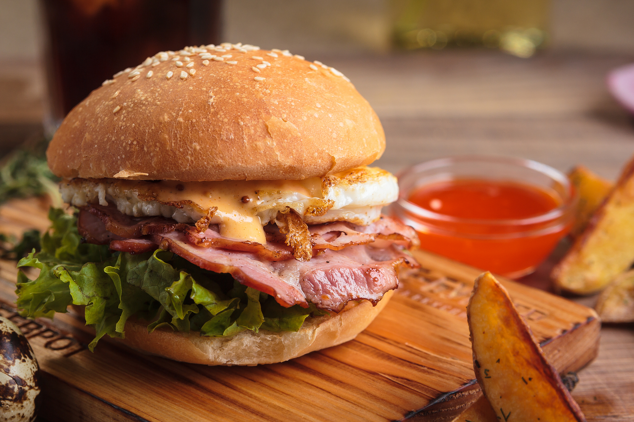 trendy breakfast burger with ham and eggs
