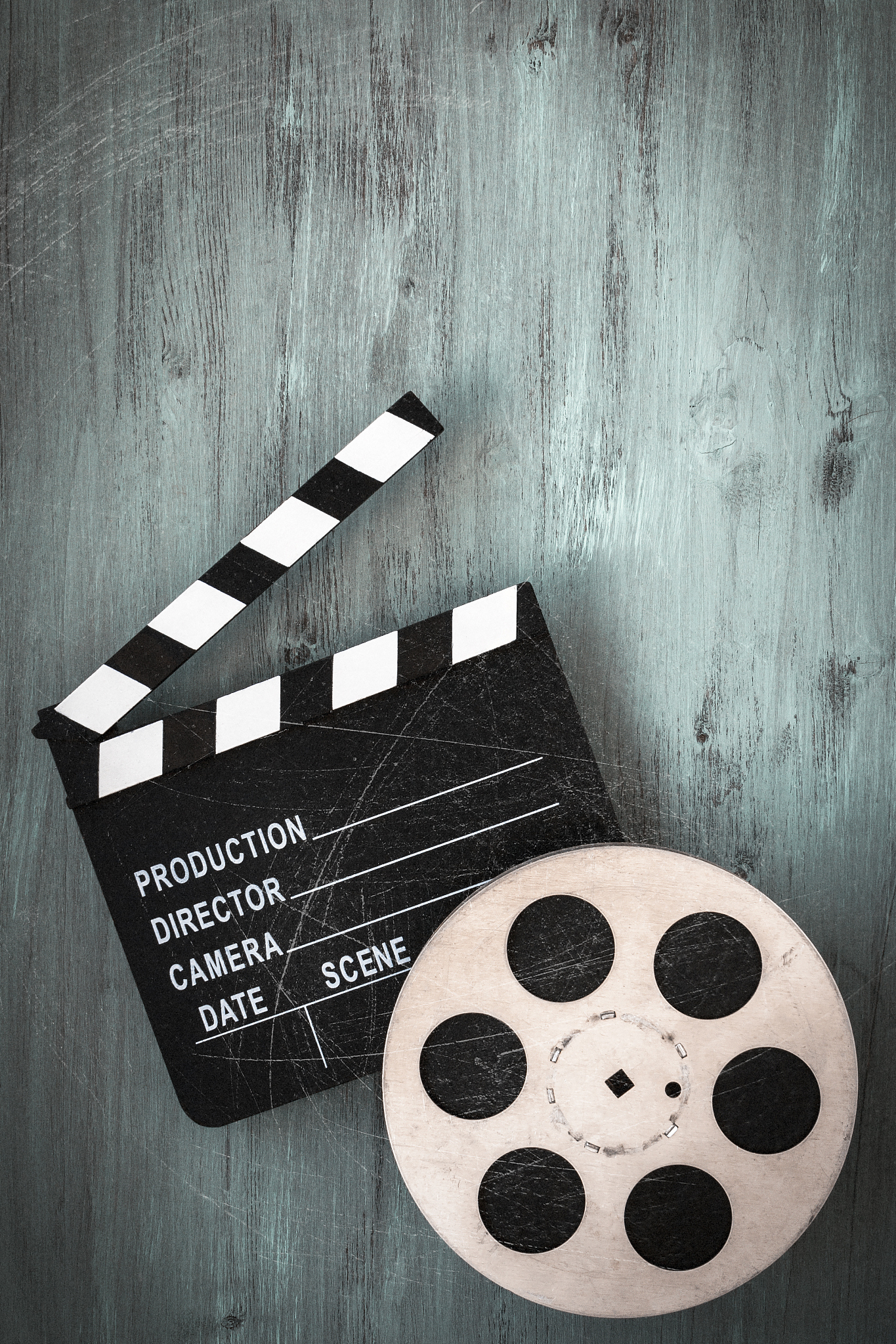 clapperboards and the reel of film