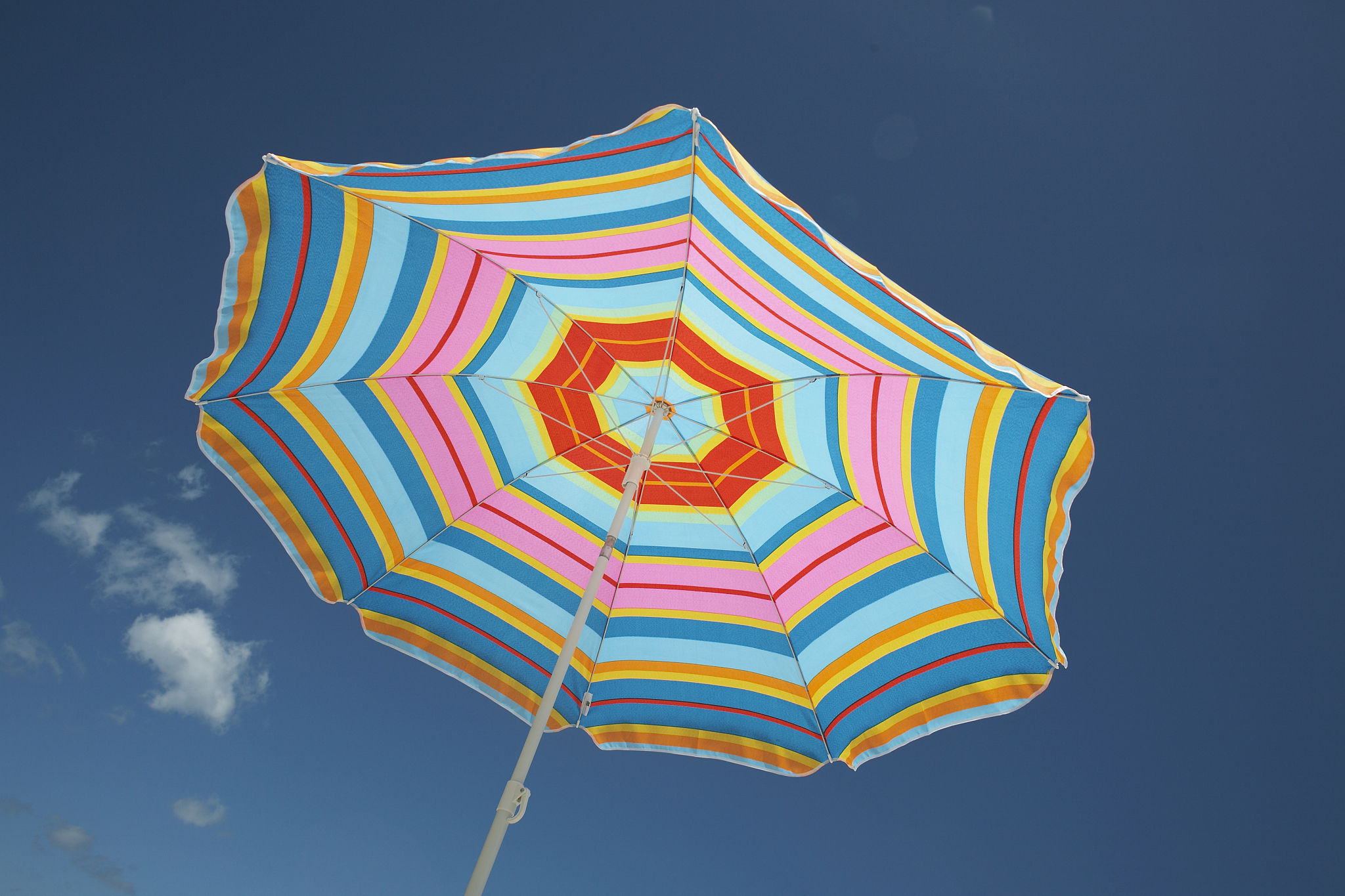 striped umbrella, low angle view