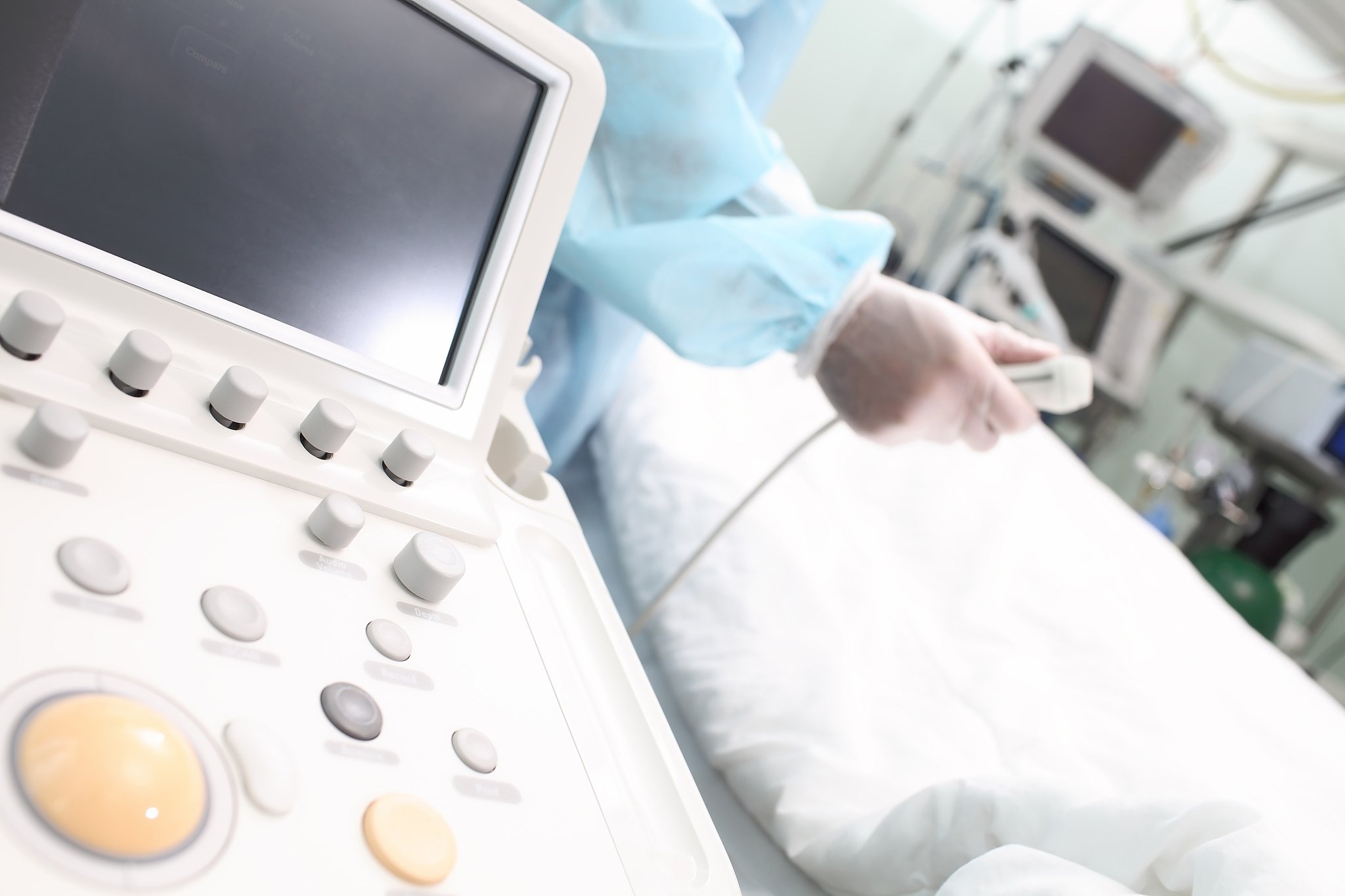 doctor examines a patient with modern medical equipment