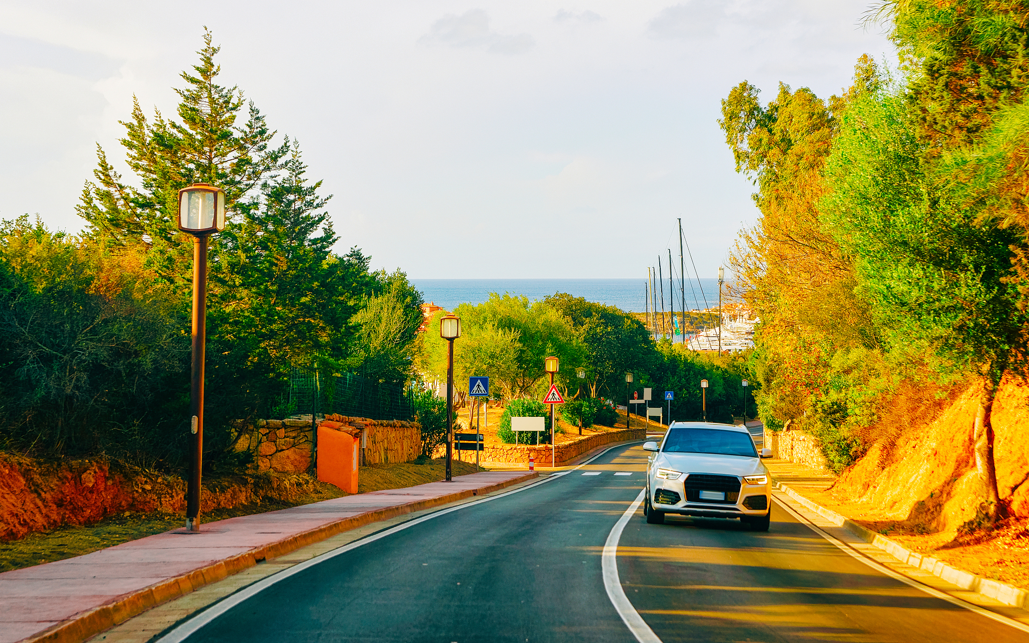 car in road in porto cervo in costa smeralda reflex