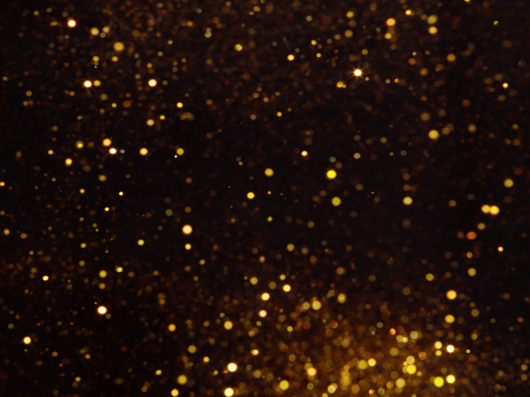 silver overlay background of glittering lights with bokeh effect