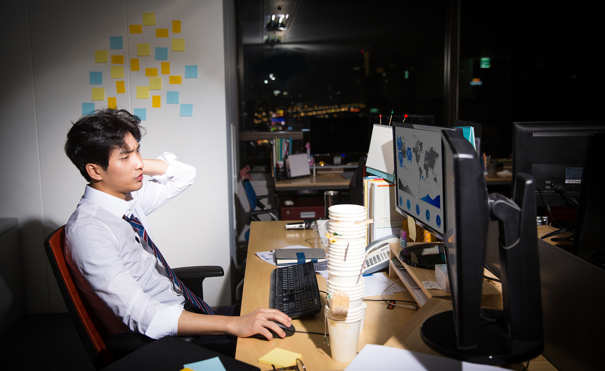 a businessman sleeping at a company