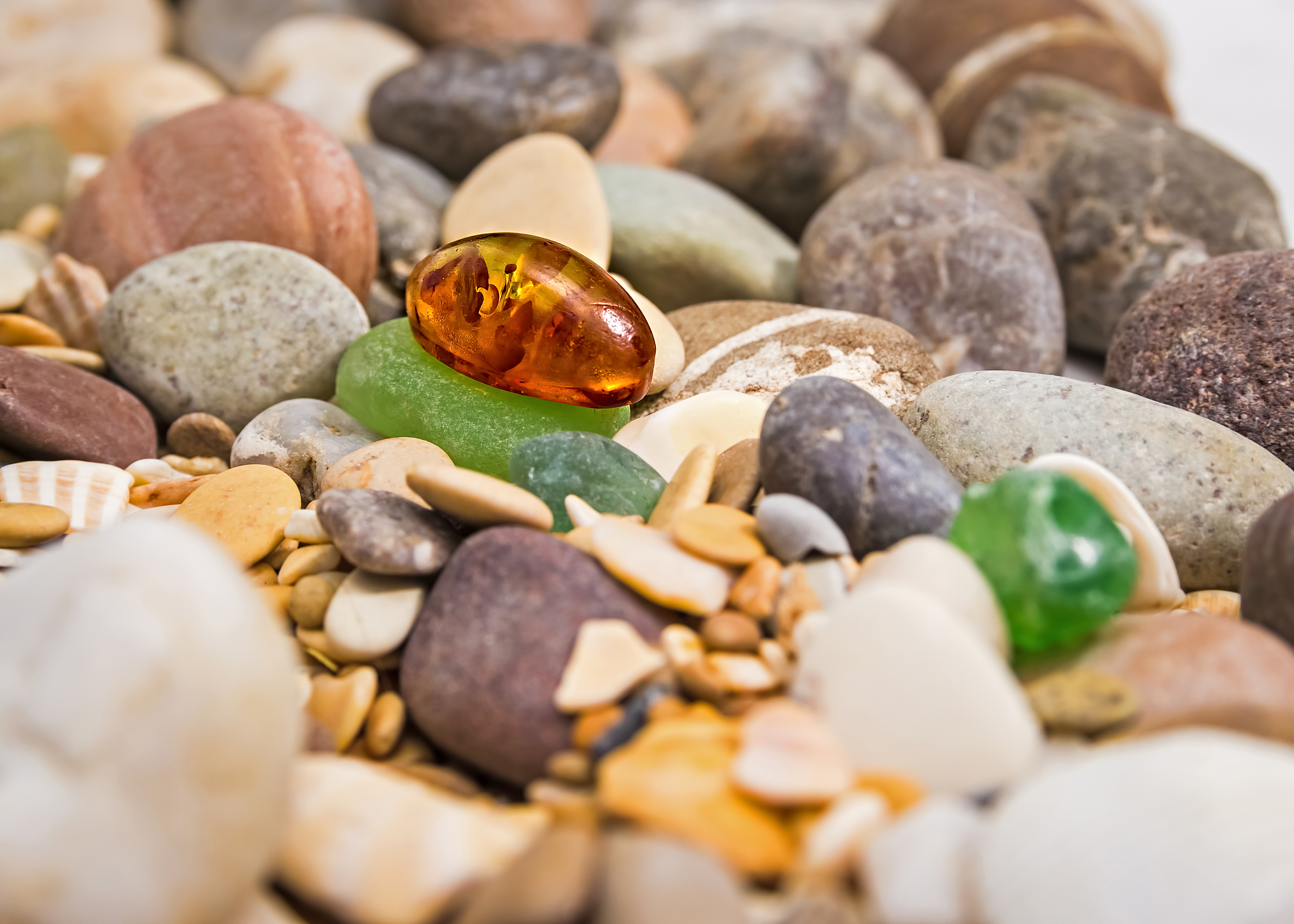 amber stone. mineral amber. rosin yellow amber. sunstone on a be