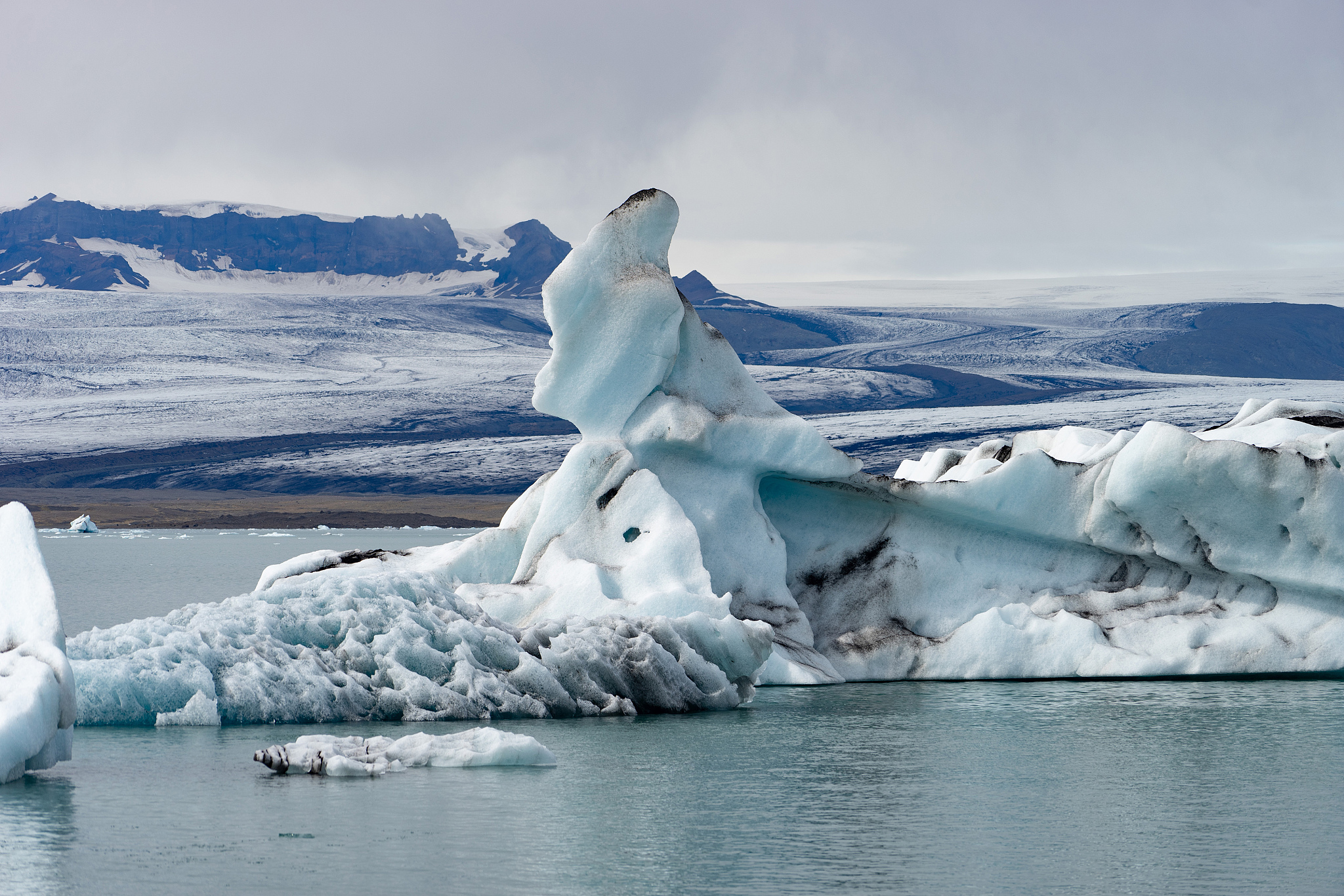 floating icebergs in jokulsarlon glacier lagoon, iceland