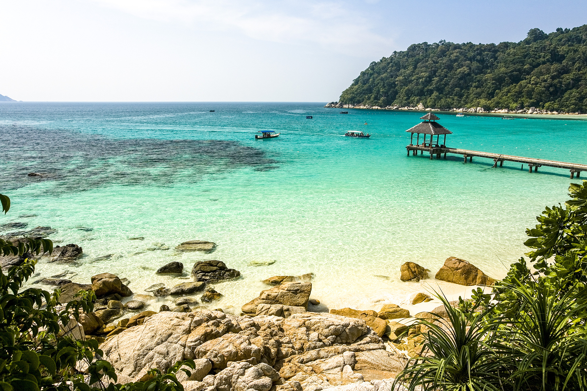 malaysia, beach and pier in the perhentian islands