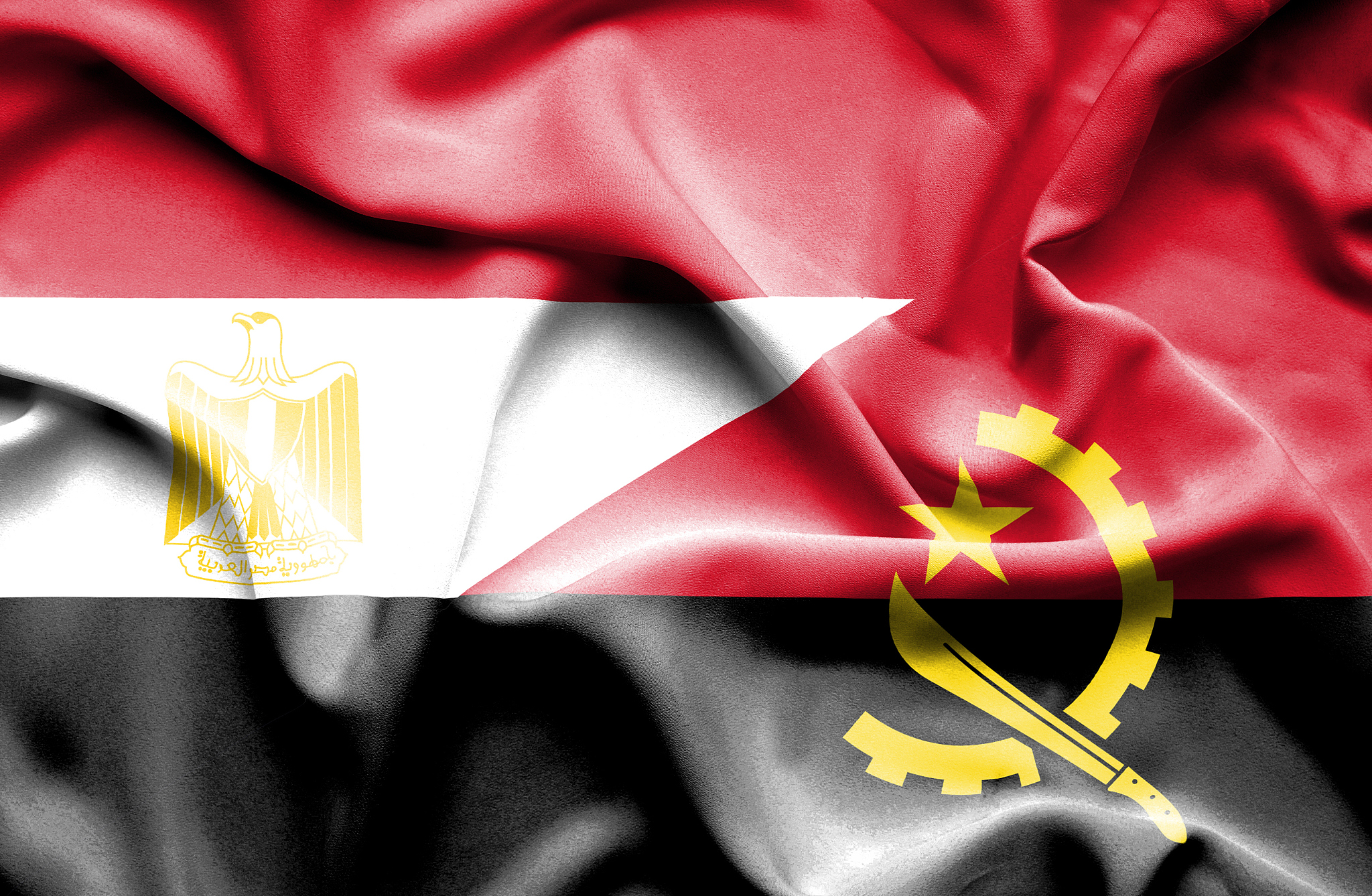 waving flag of angola and egypt