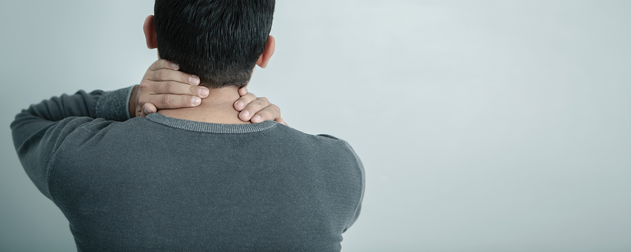 pain in the neck; medical concept, back view