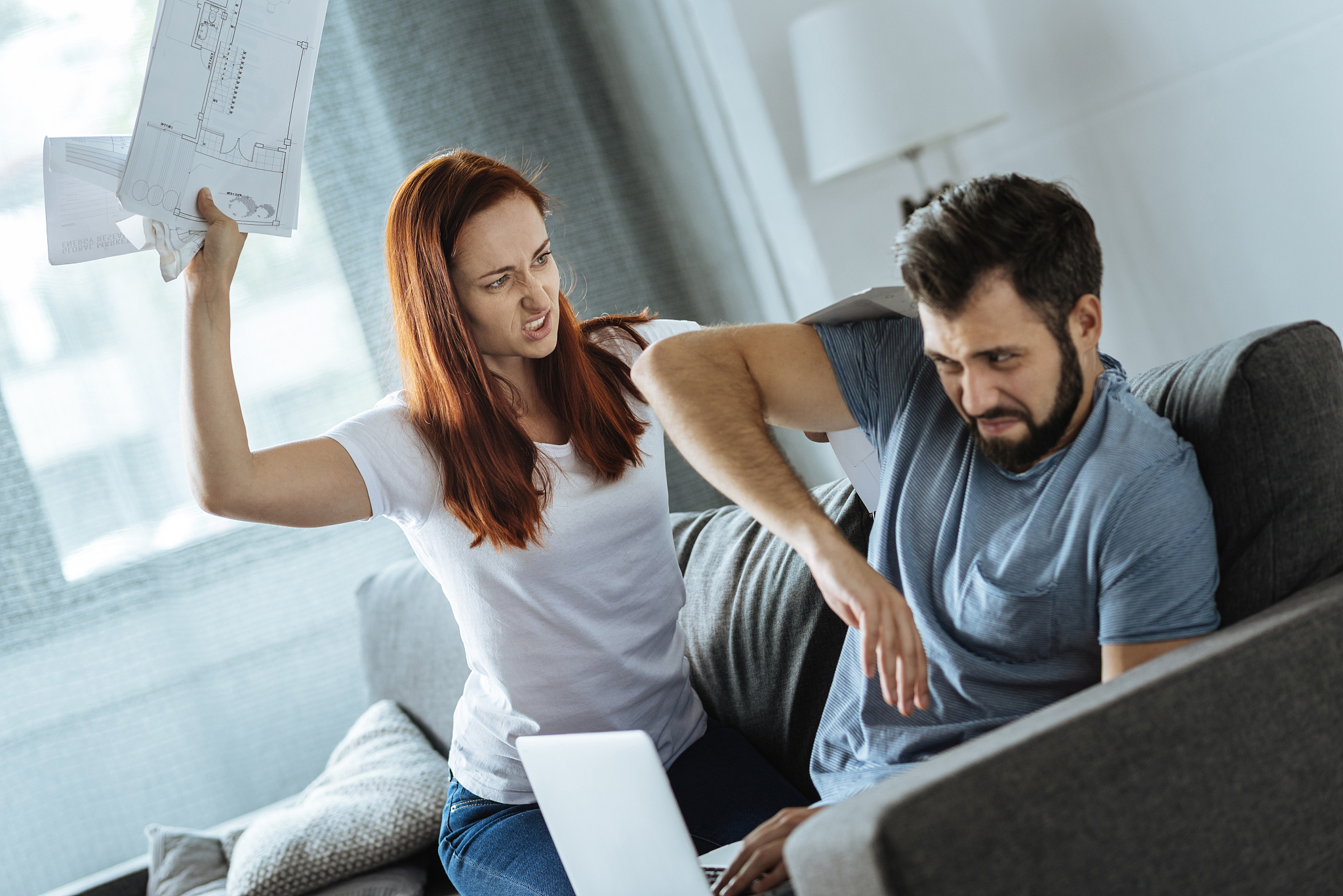 furious red haired woman being angry at her boyfriend