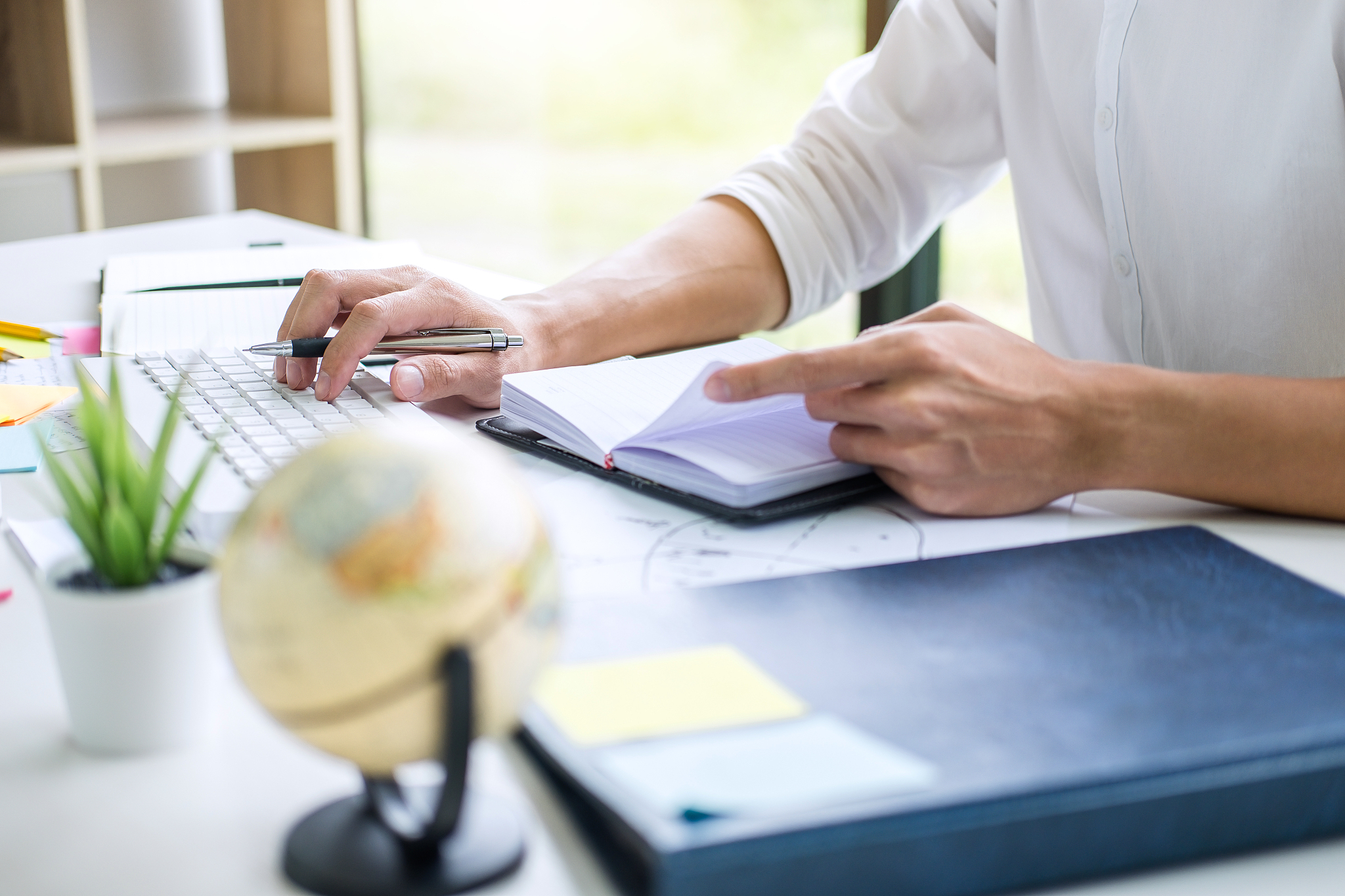 businessman working writing making note business plan and graphi