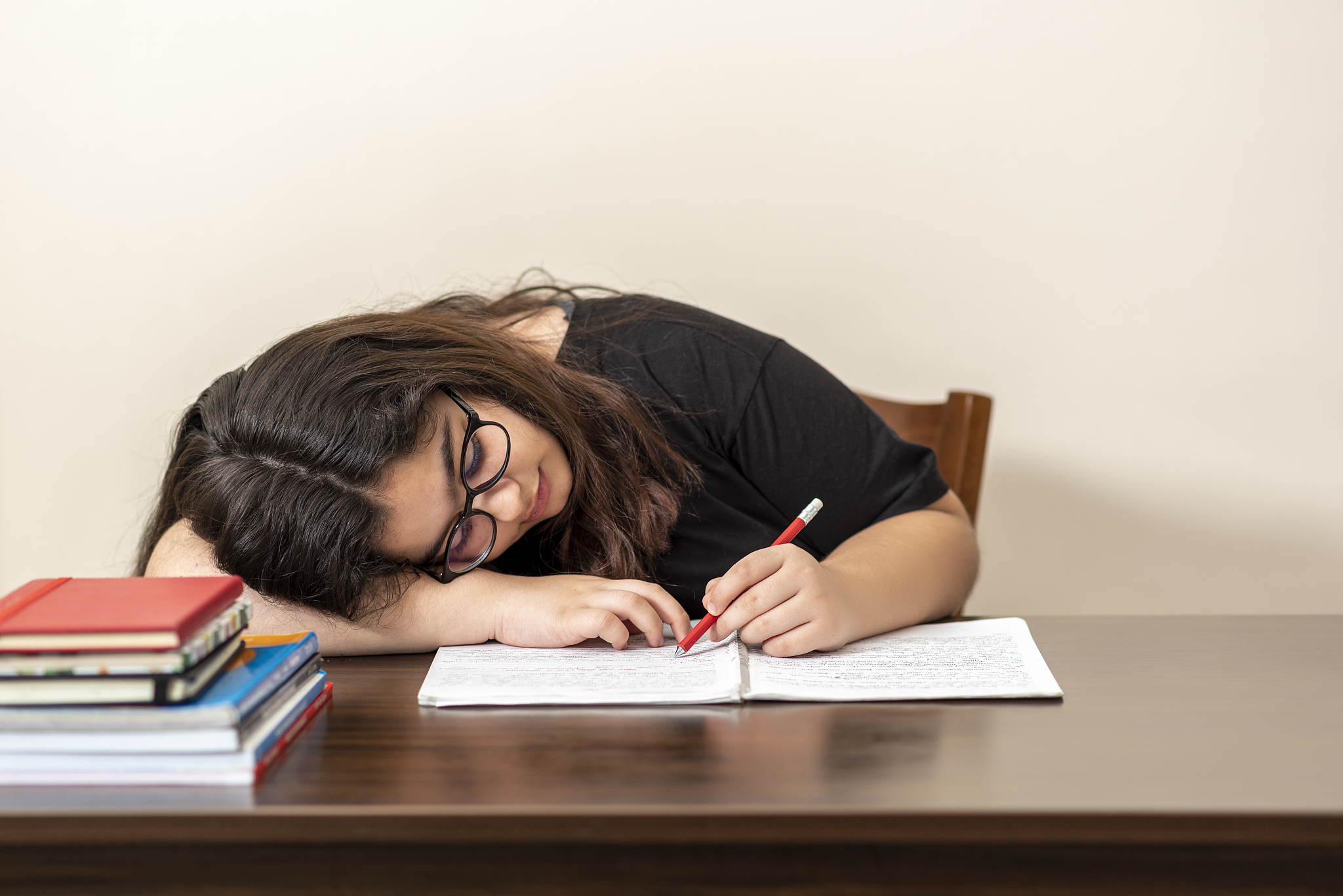 13 years old girl doing homework