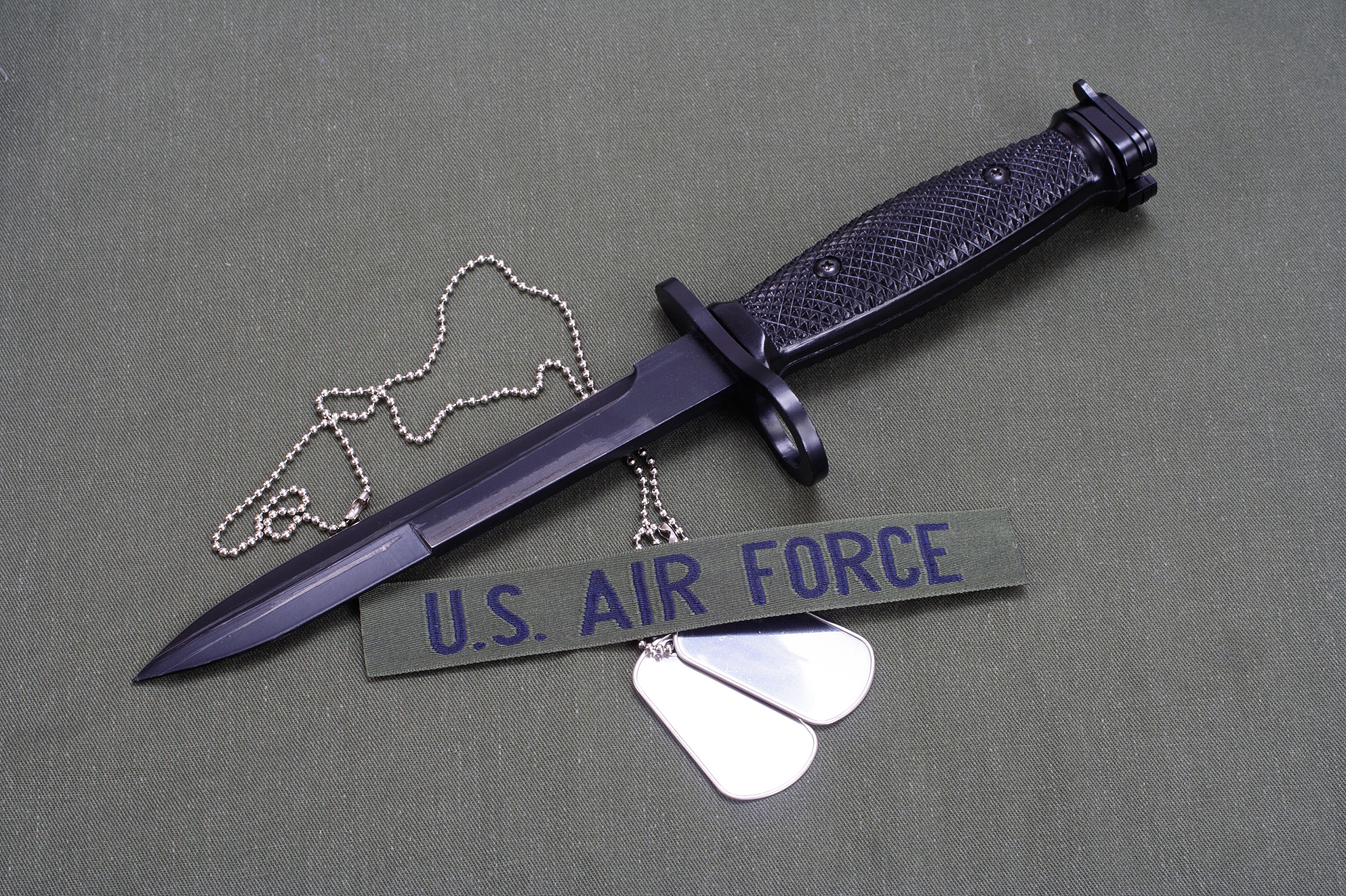 bayonet and on us air force uniform background
