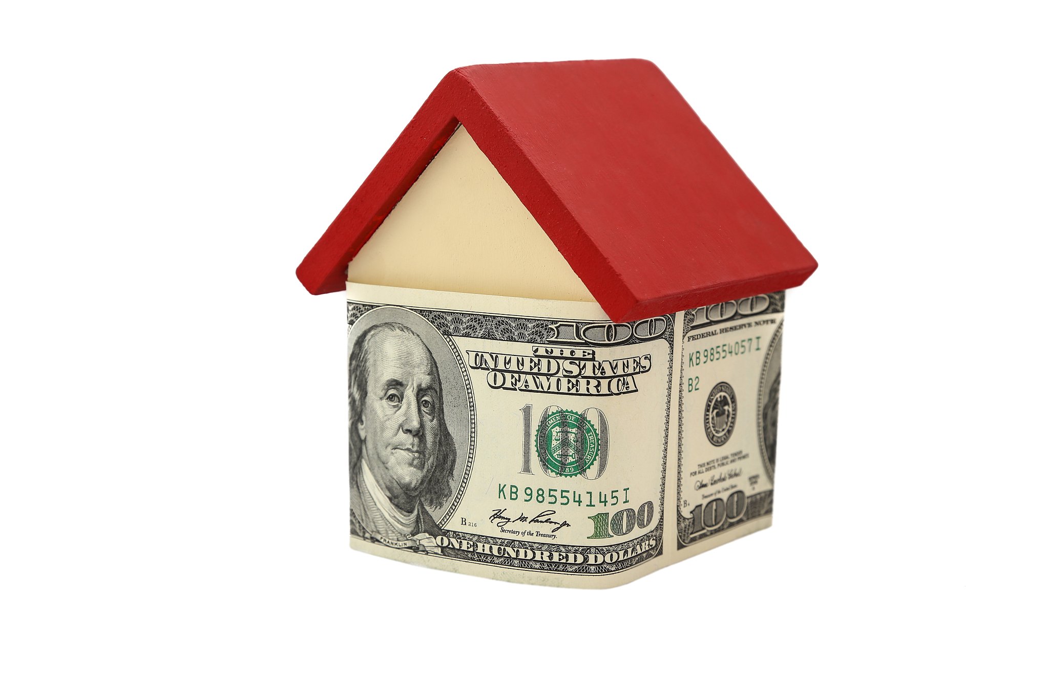 house surrounded by dollars